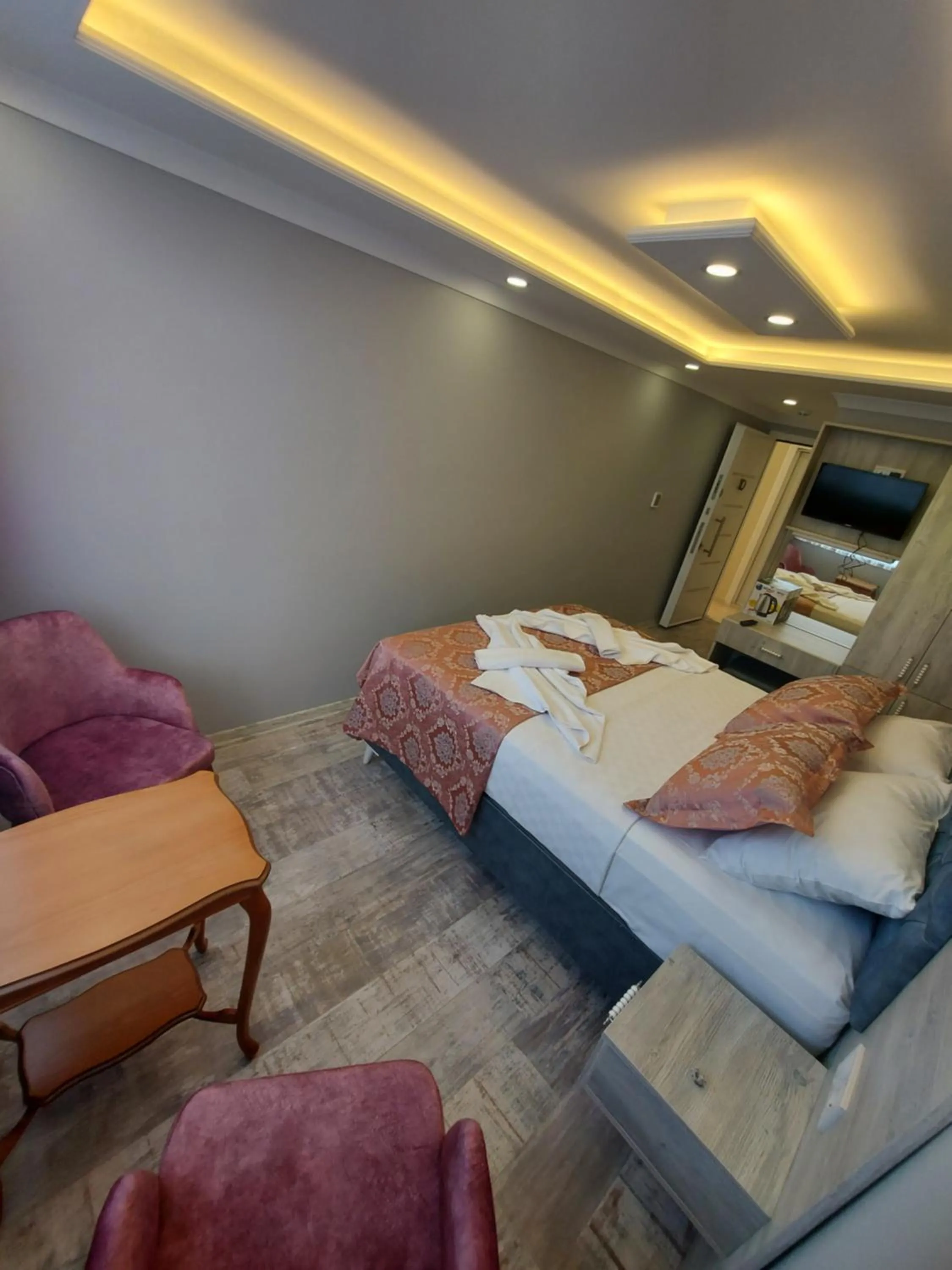 Bed in VERSECA HOTEL