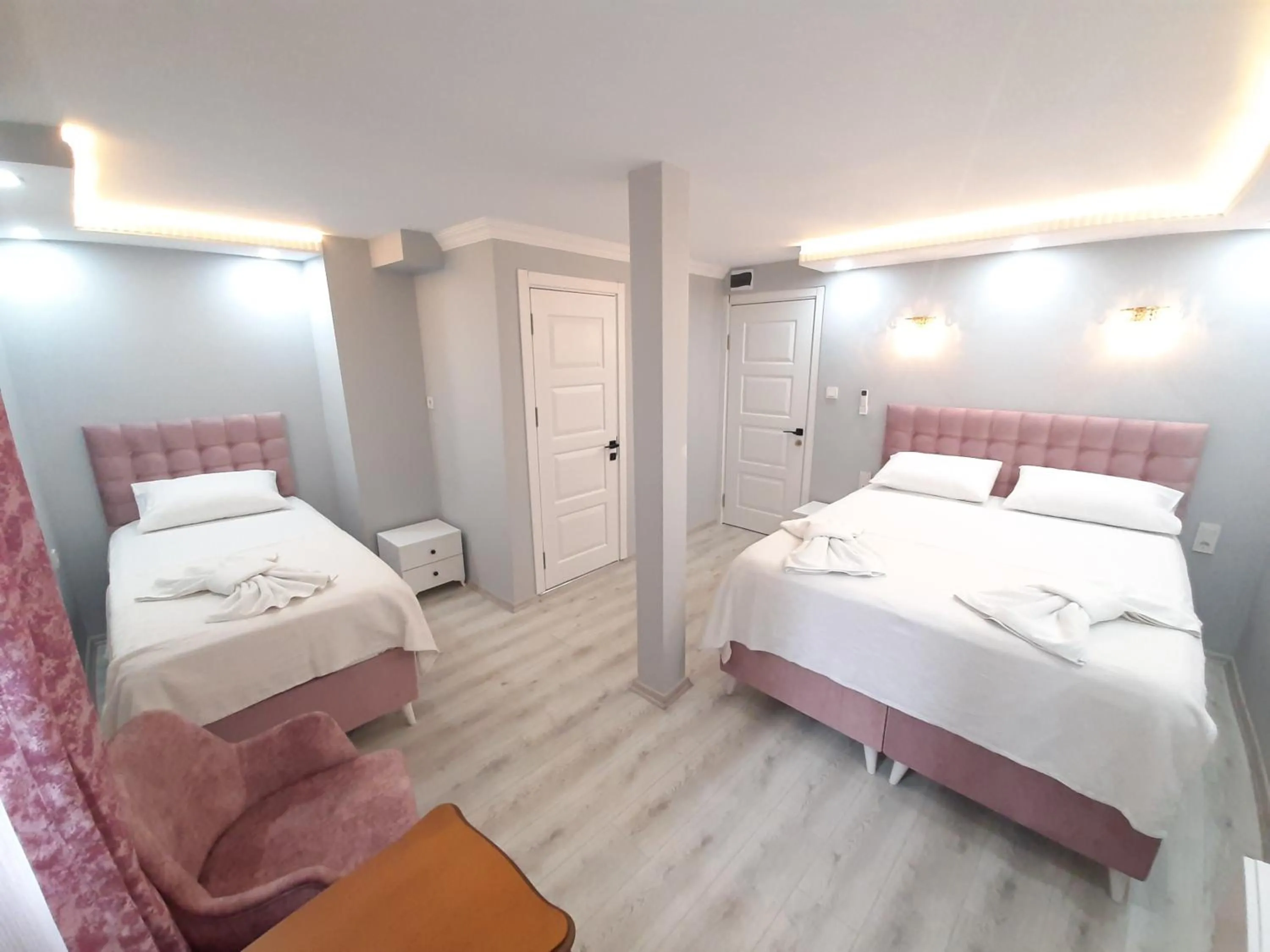 Bed in VERSECA HOTEL