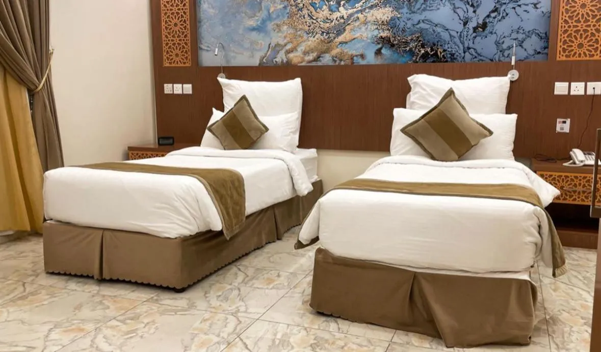 Bed in Taj Aleiman Hotel 