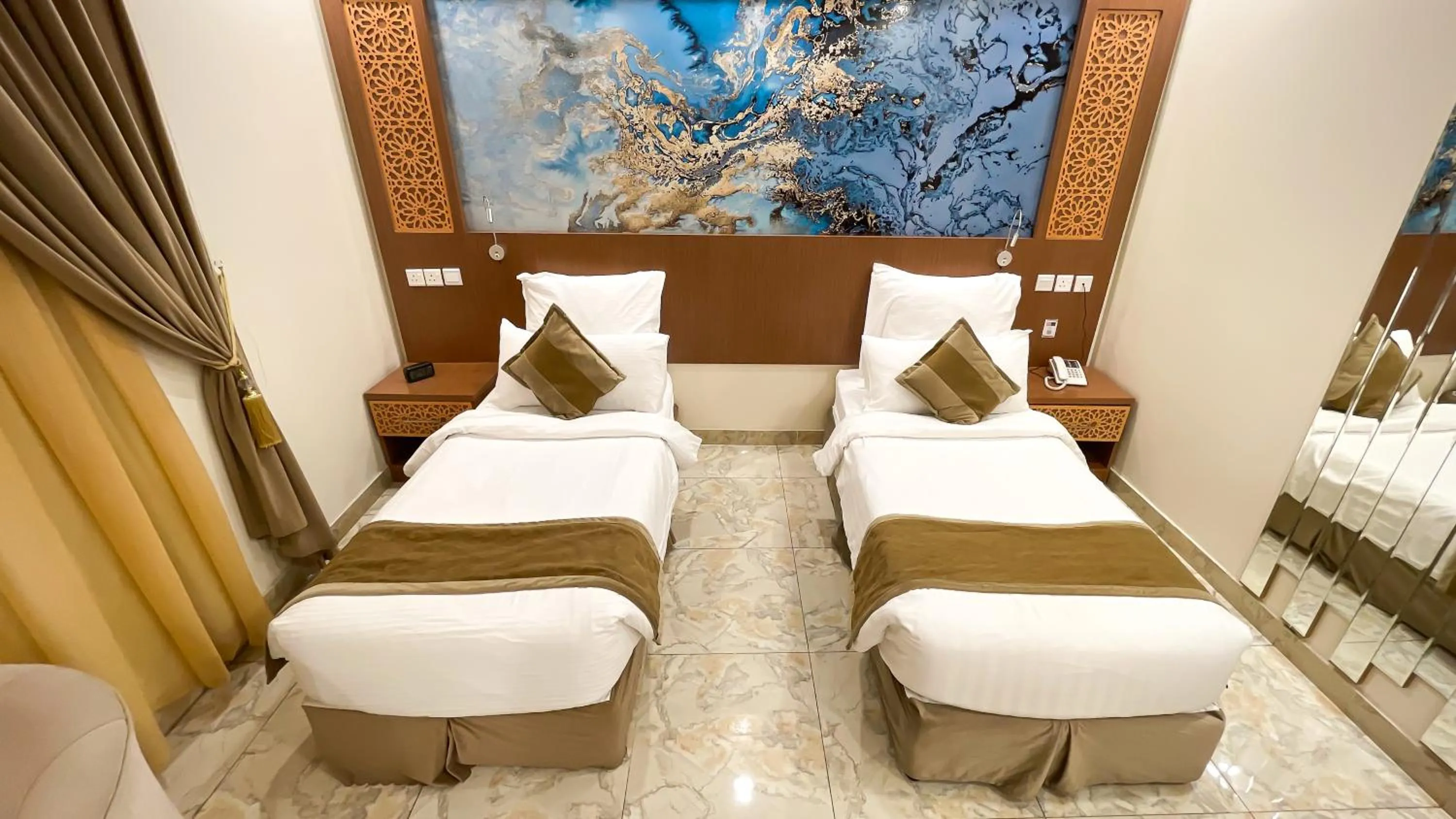 Bed in Taj Aleiman Hotel 
