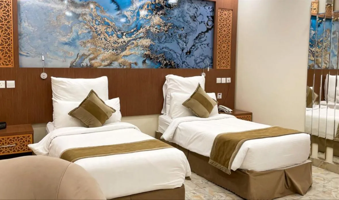 Bed in Taj Aleiman Hotel 