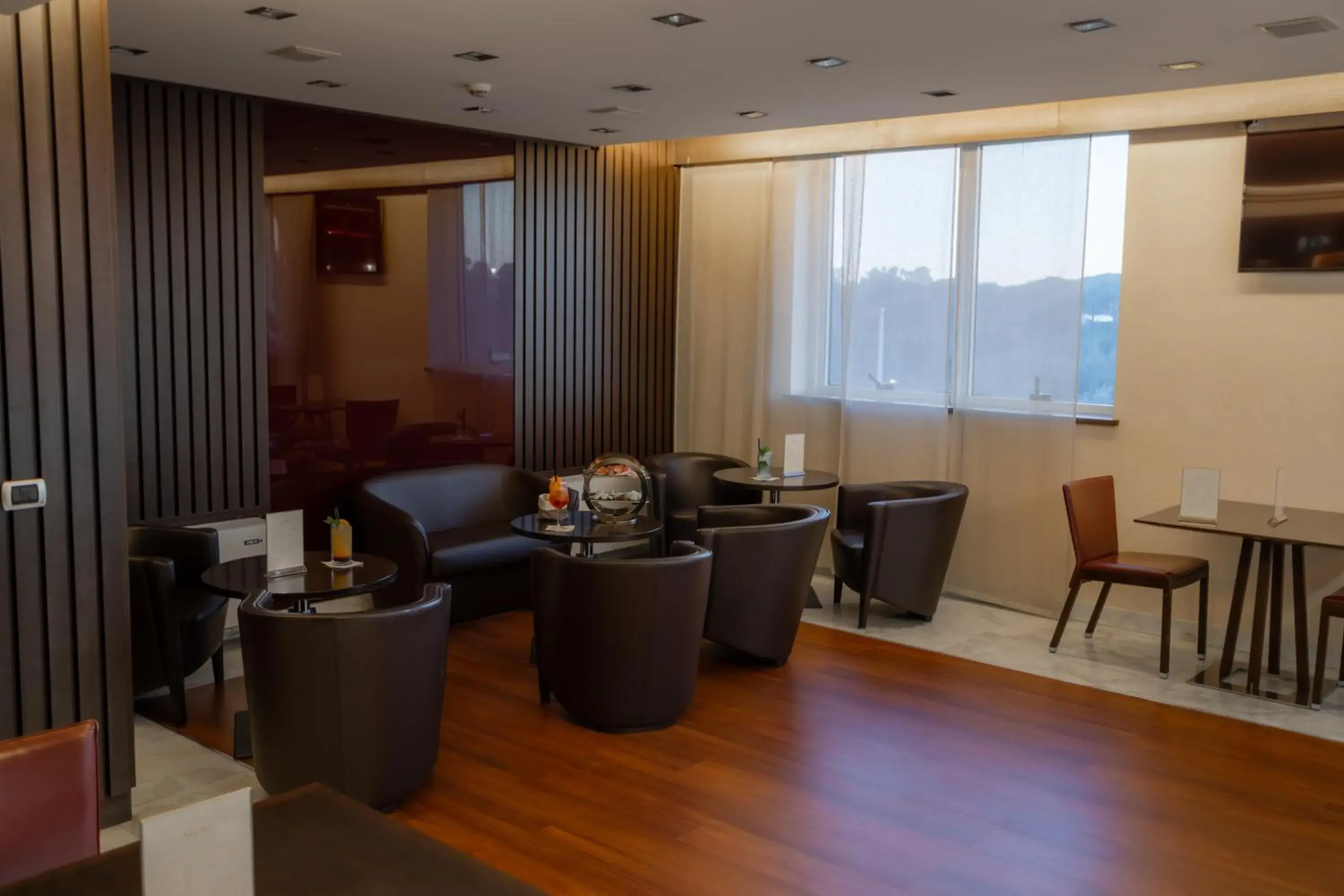 Lounge or bar in Papillo Hotels & Resorts Roma Lounge or bar in Papillo Hotels & Resorts Roma