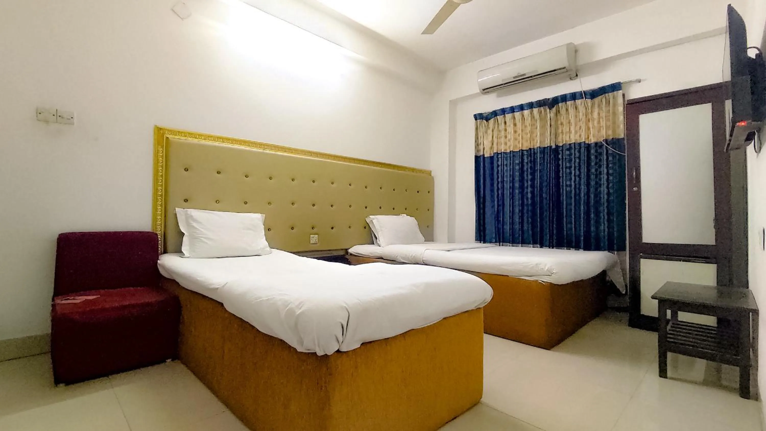 Bed in White Rose Suites Ltd