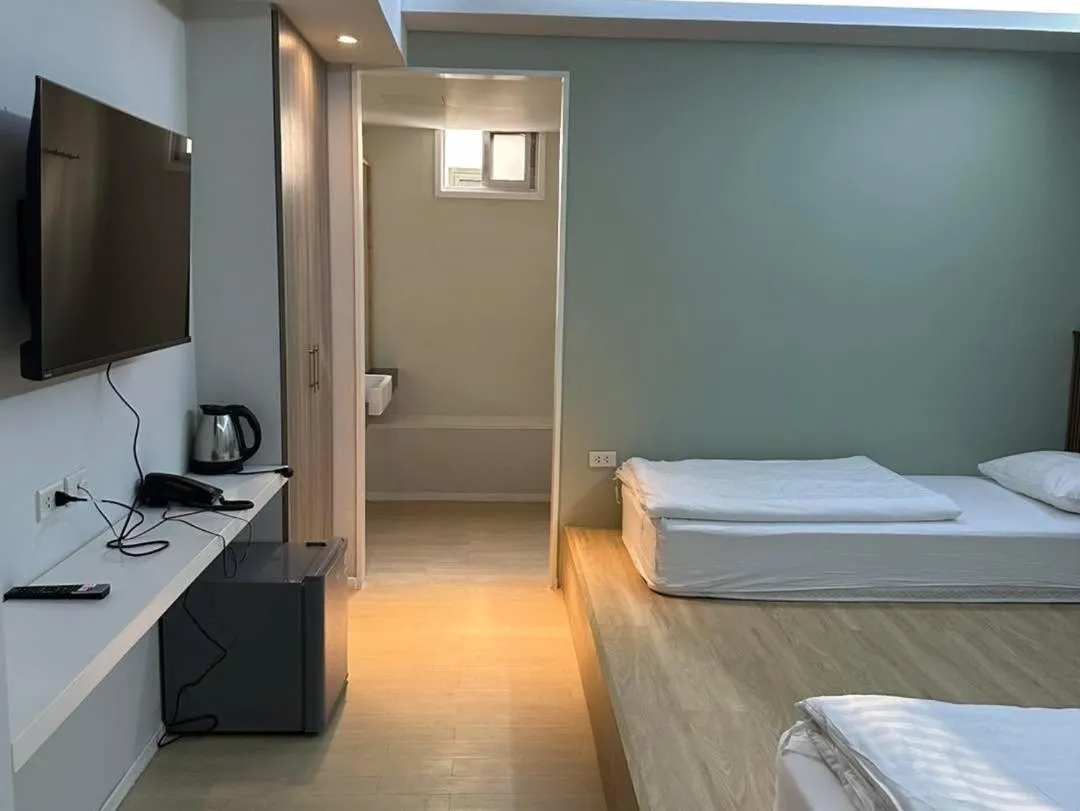 Bed in Kitzio House Hotel Huai Kwang