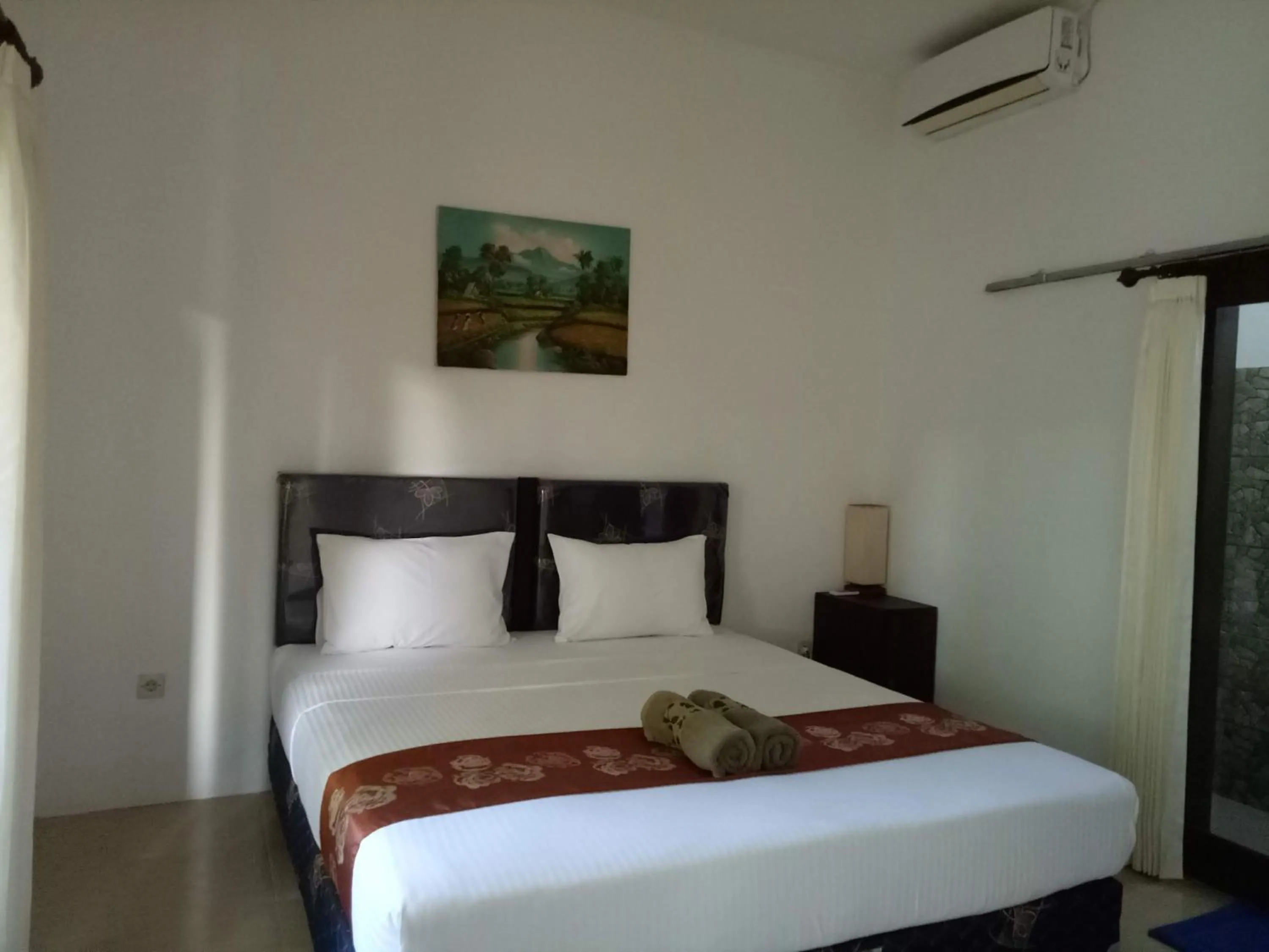 Bed in Ani Bungalows