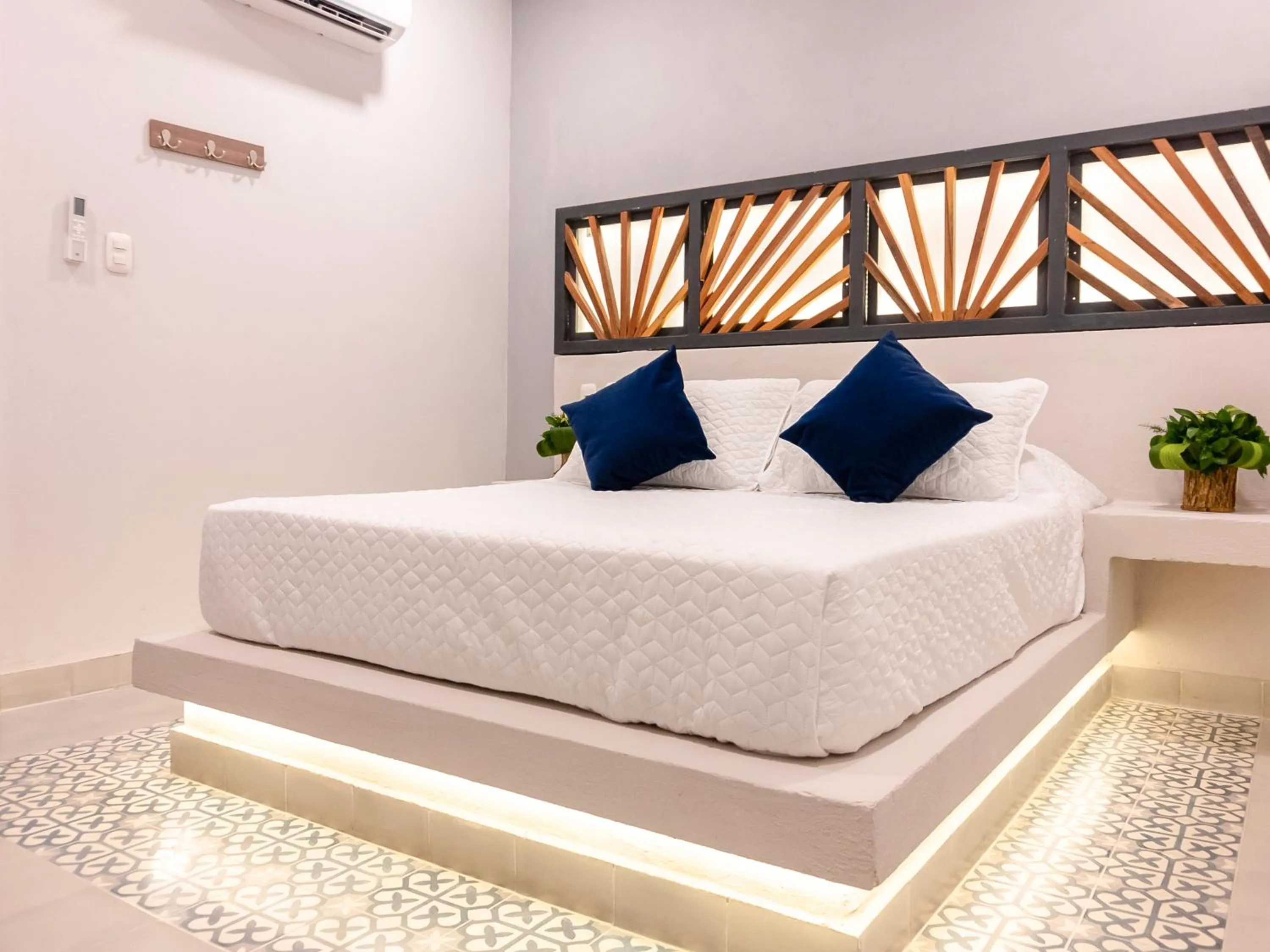 Bed in The Garden Suites