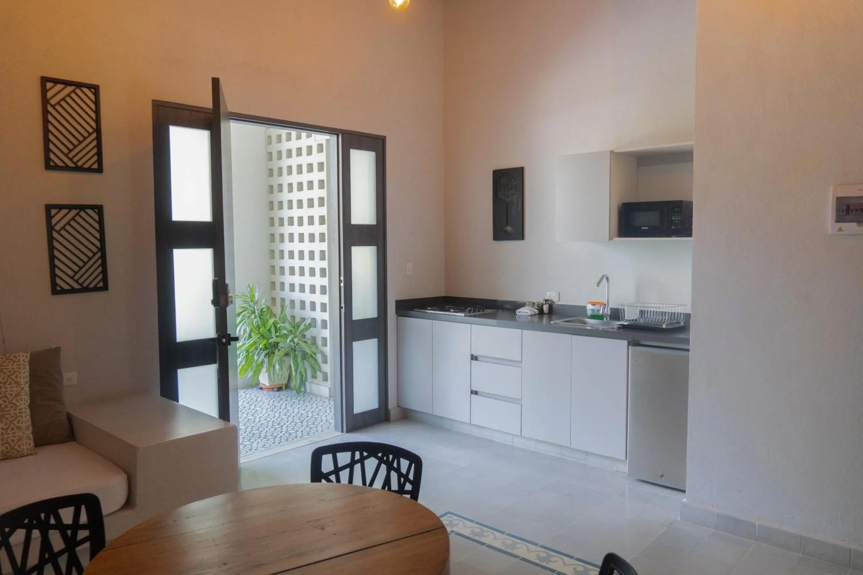 Kitchen or kitchenette in The Garden Suites