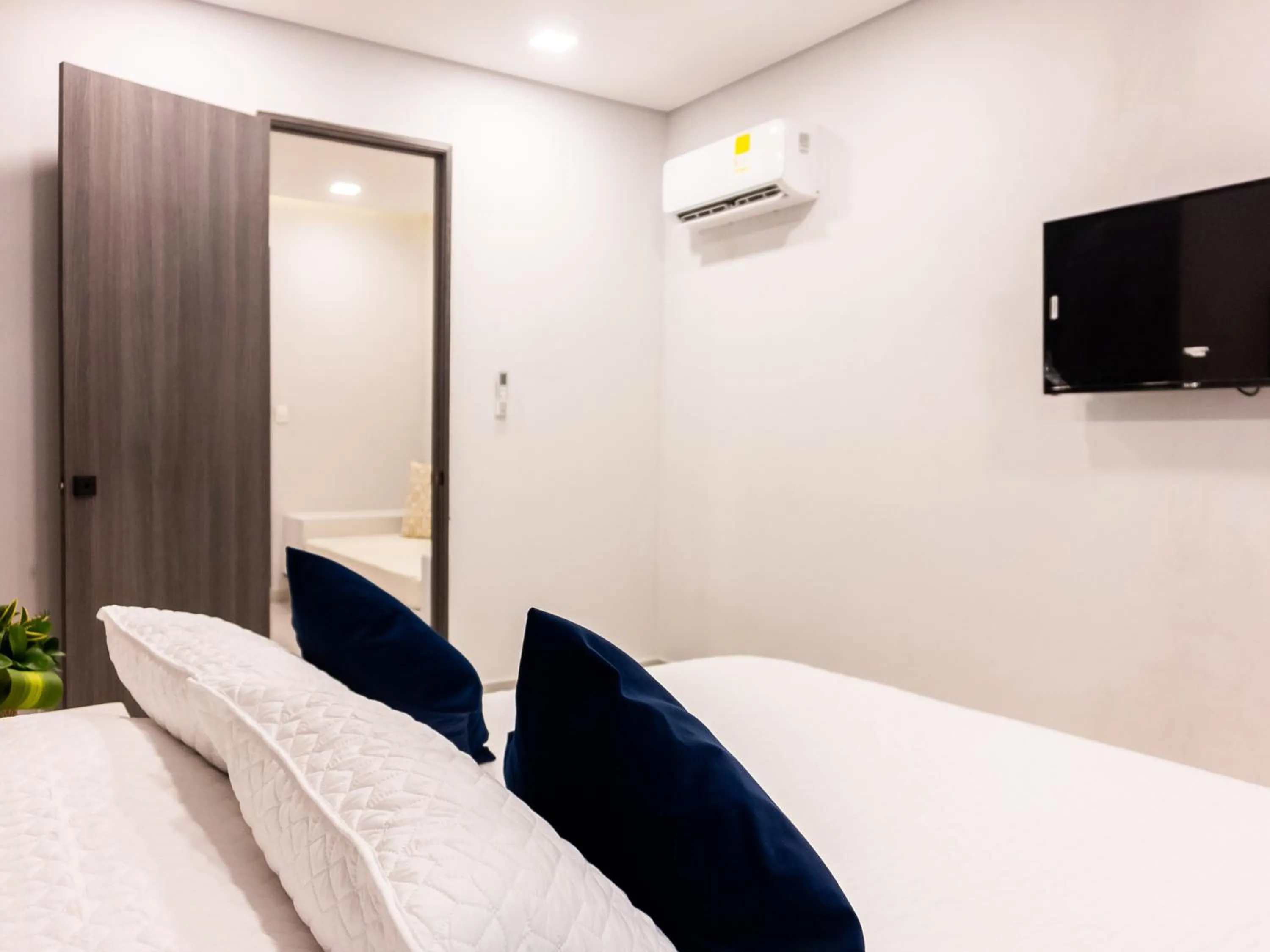 Bed in The Garden Suites