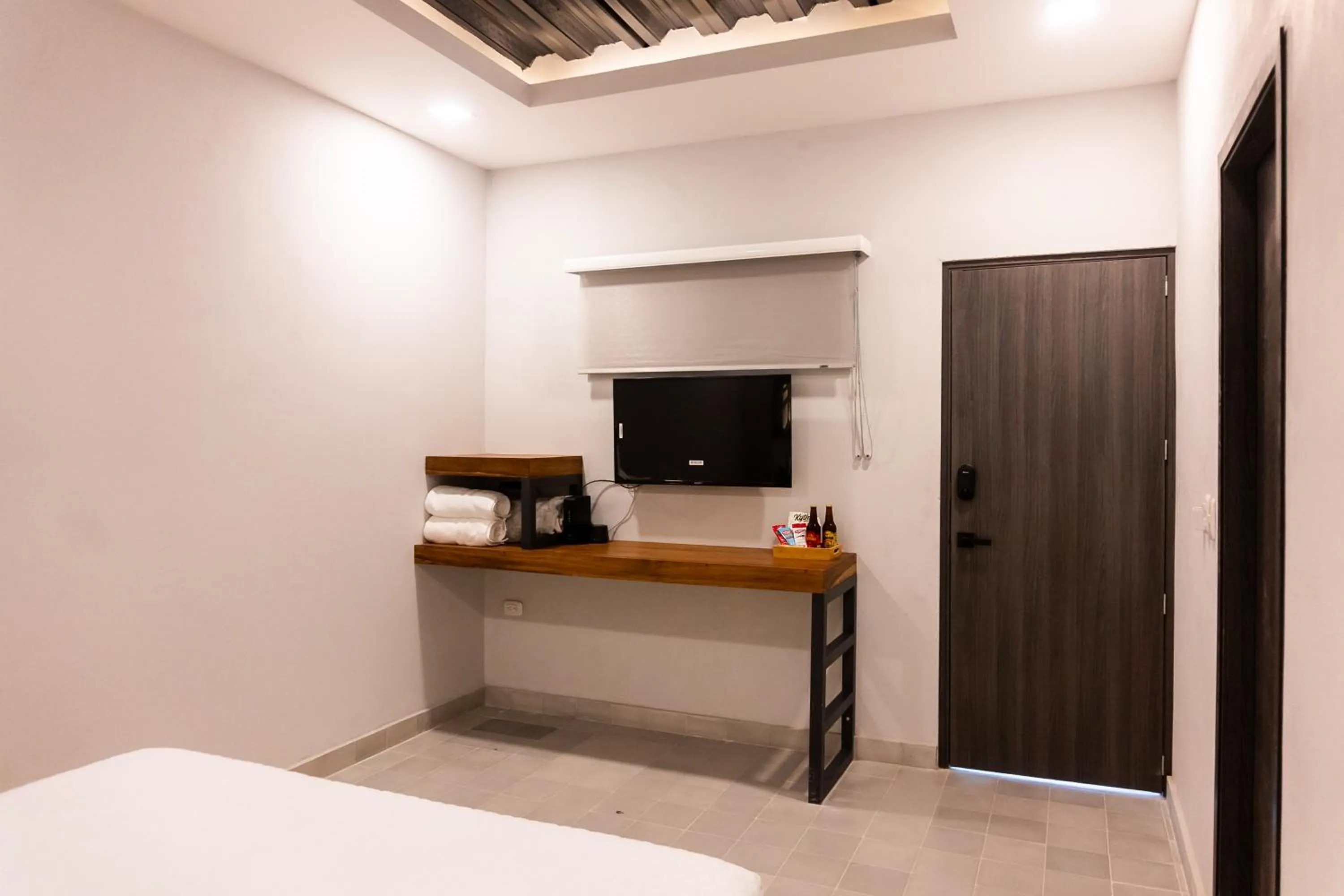 Photo of the whole room, Bed in The Garden Suites