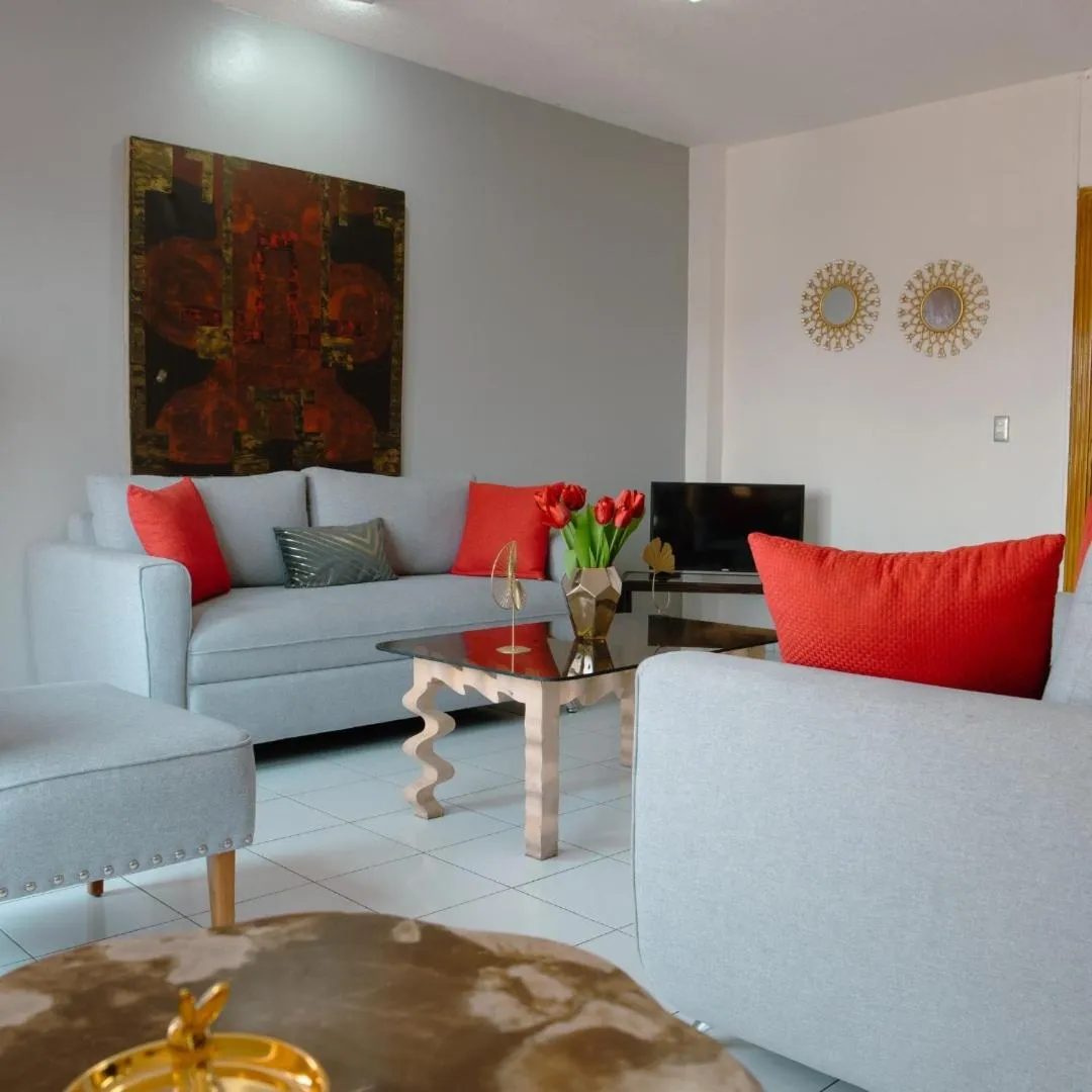 Living room in Aparthotel Guijarros