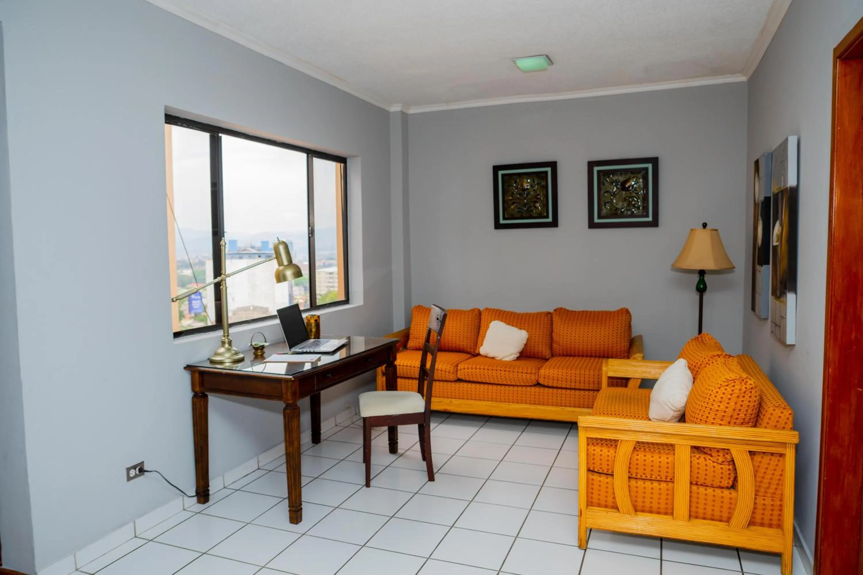 Seating area in Aparthotel Guijarros