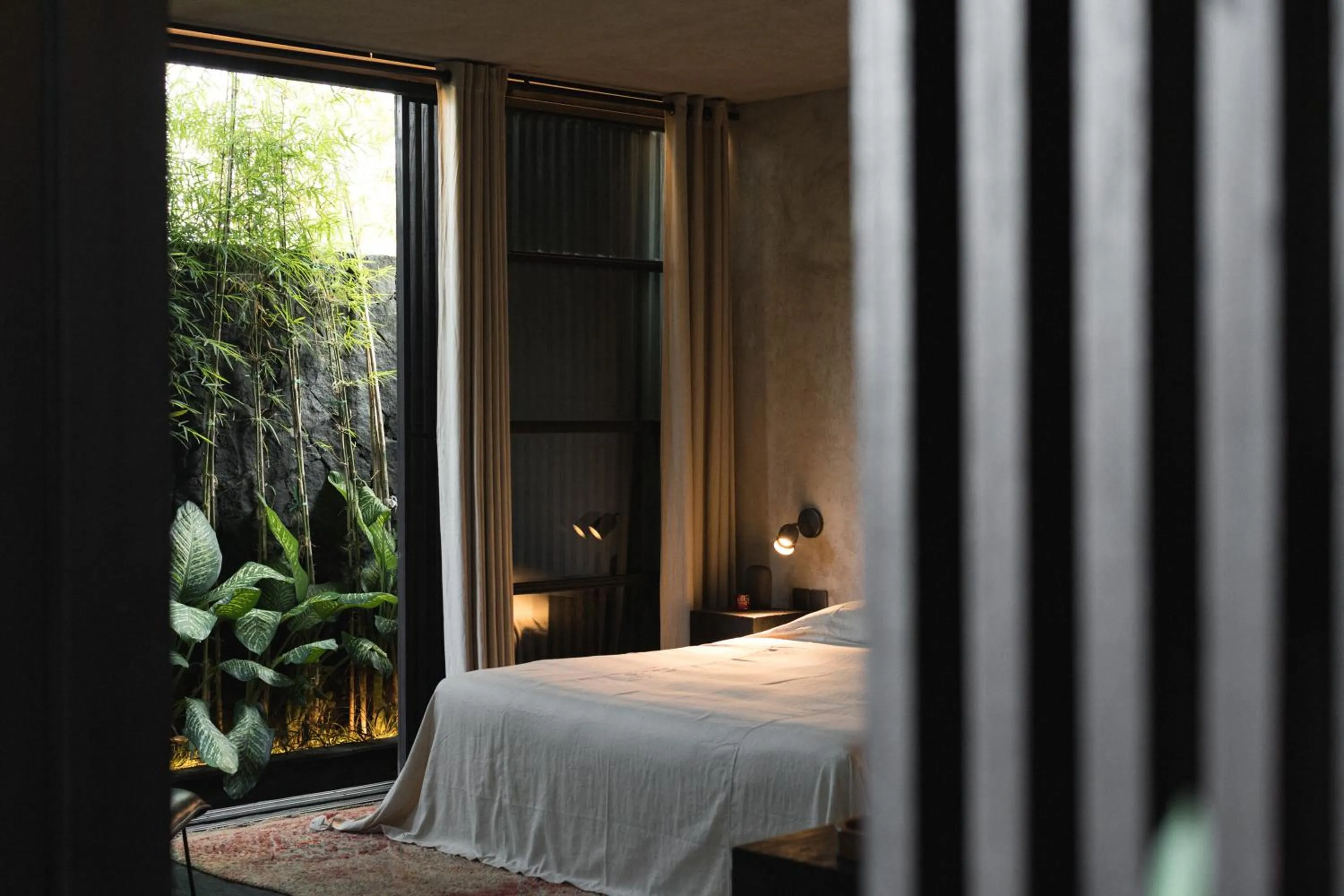 Bed in The Bohemian Bali, a Member of Design Hotels