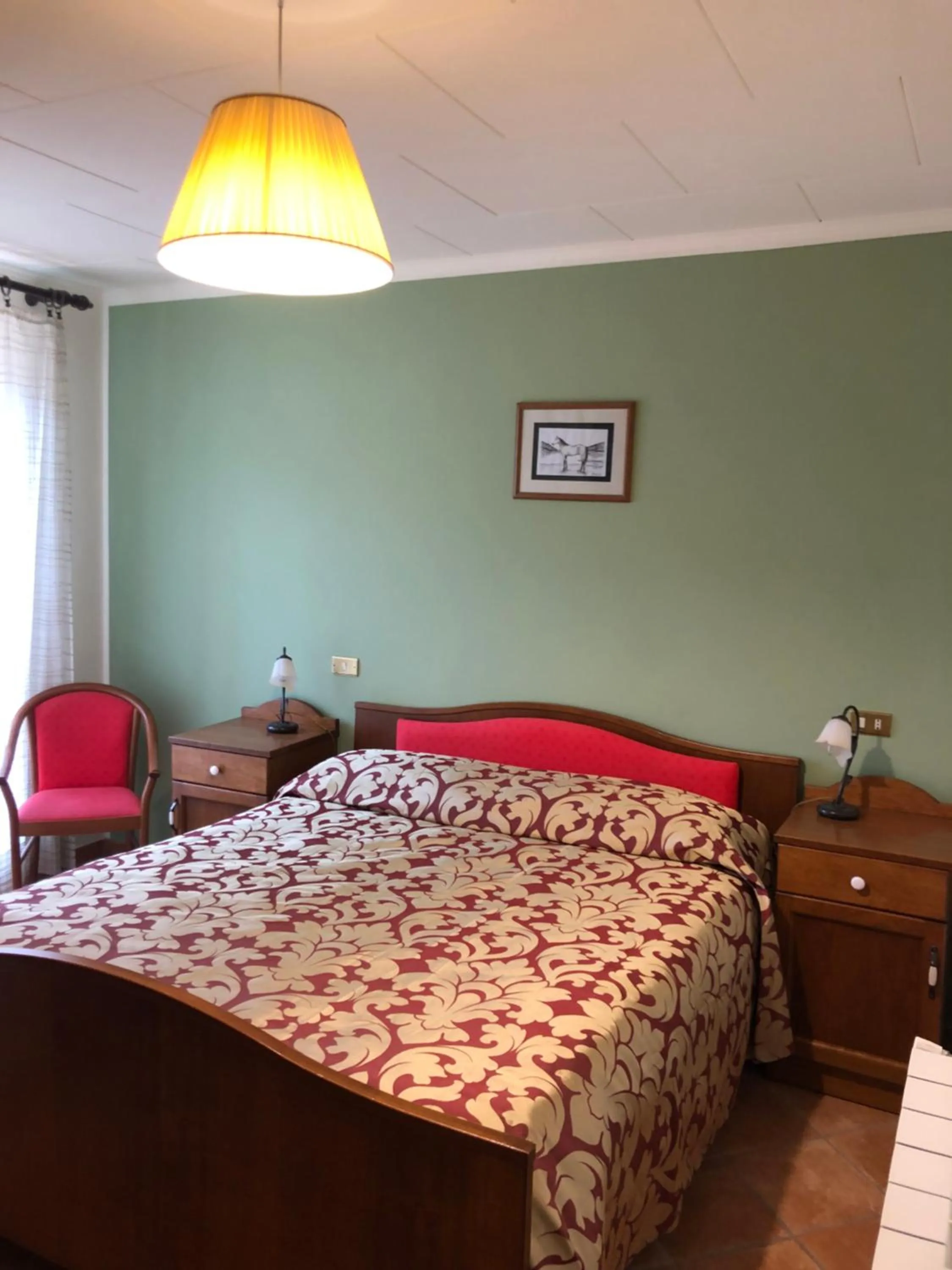 Bed in Albergo Miramonti