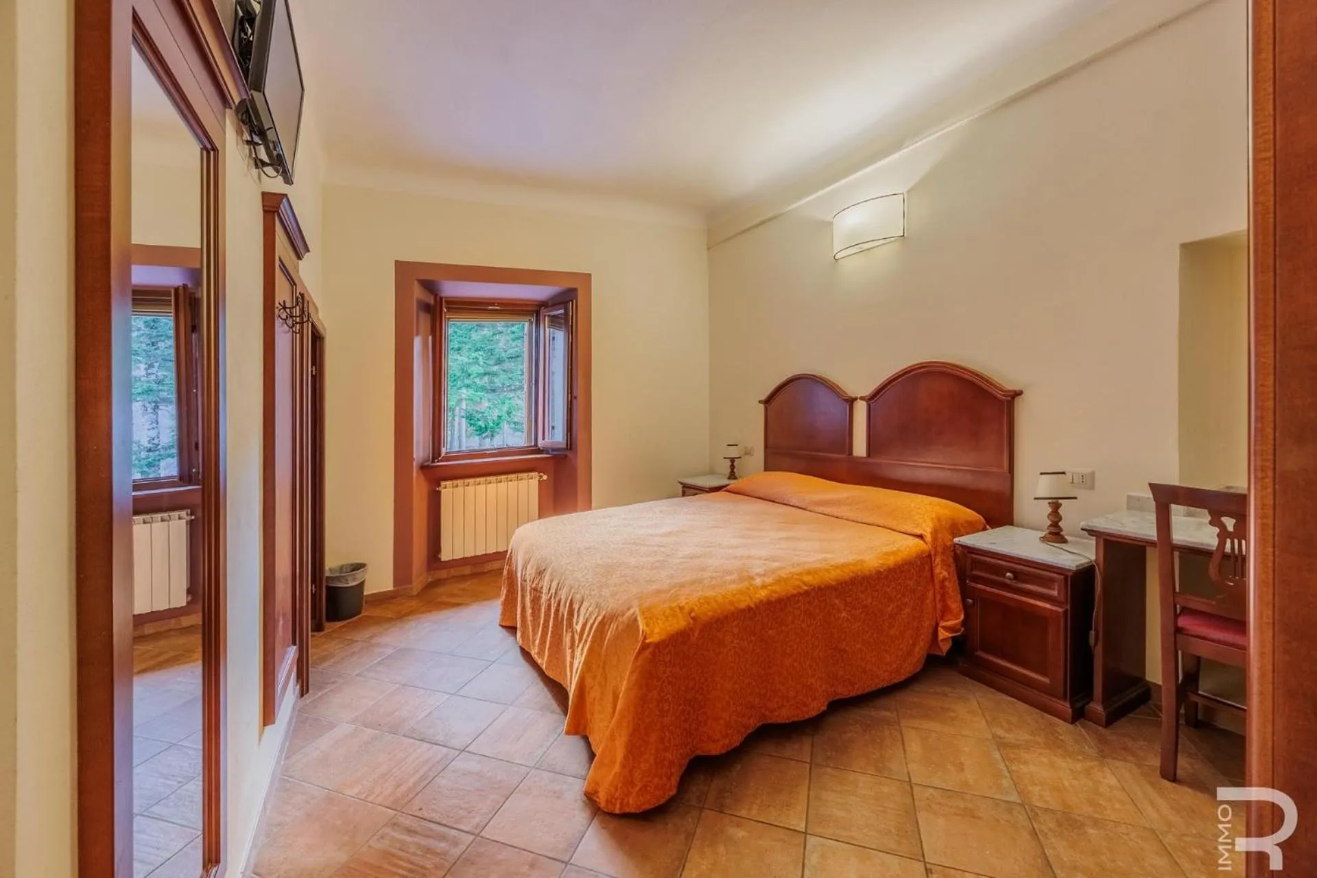 Bed in Albergo Miramonti