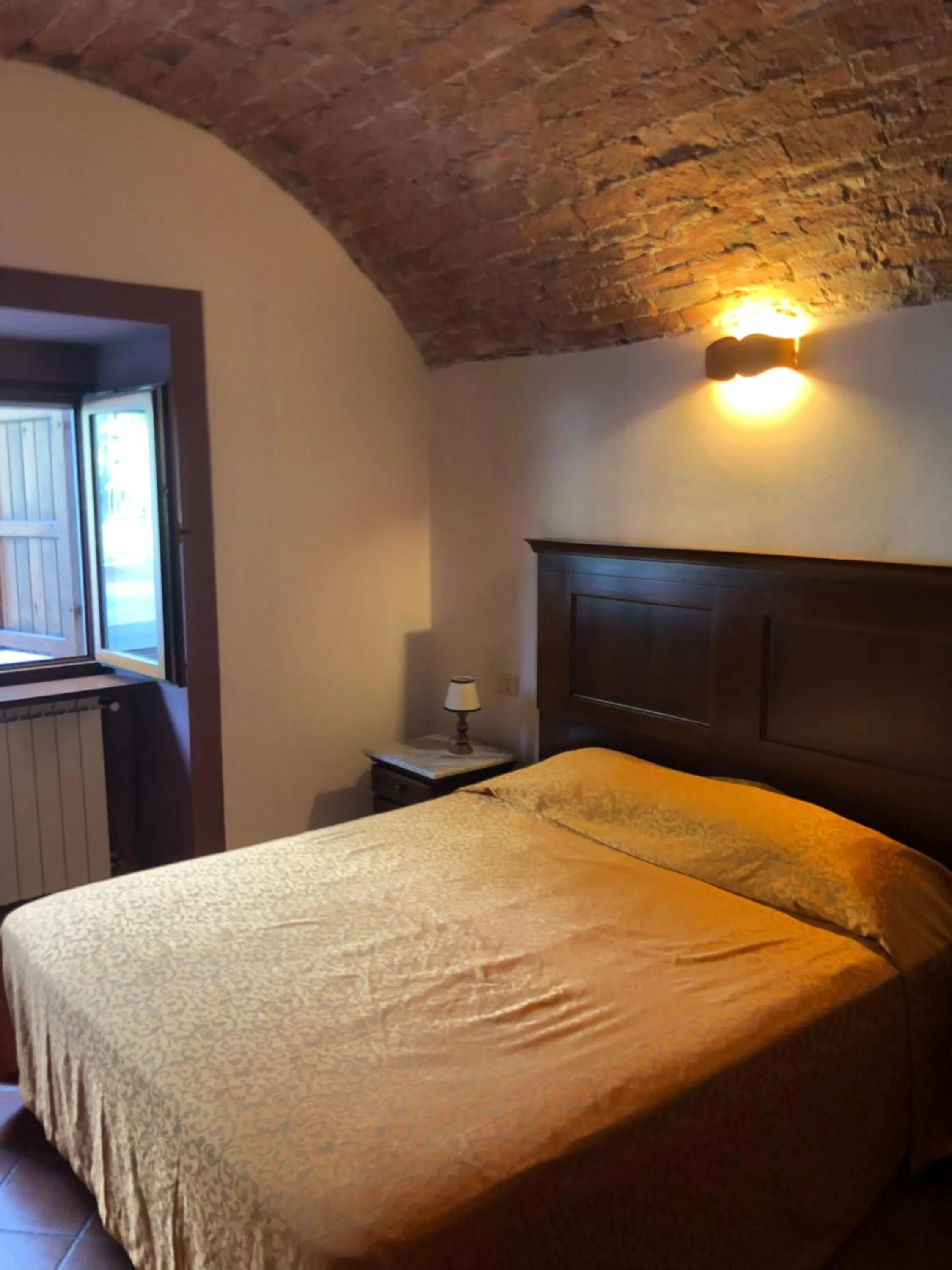 Bed in Albergo Miramonti