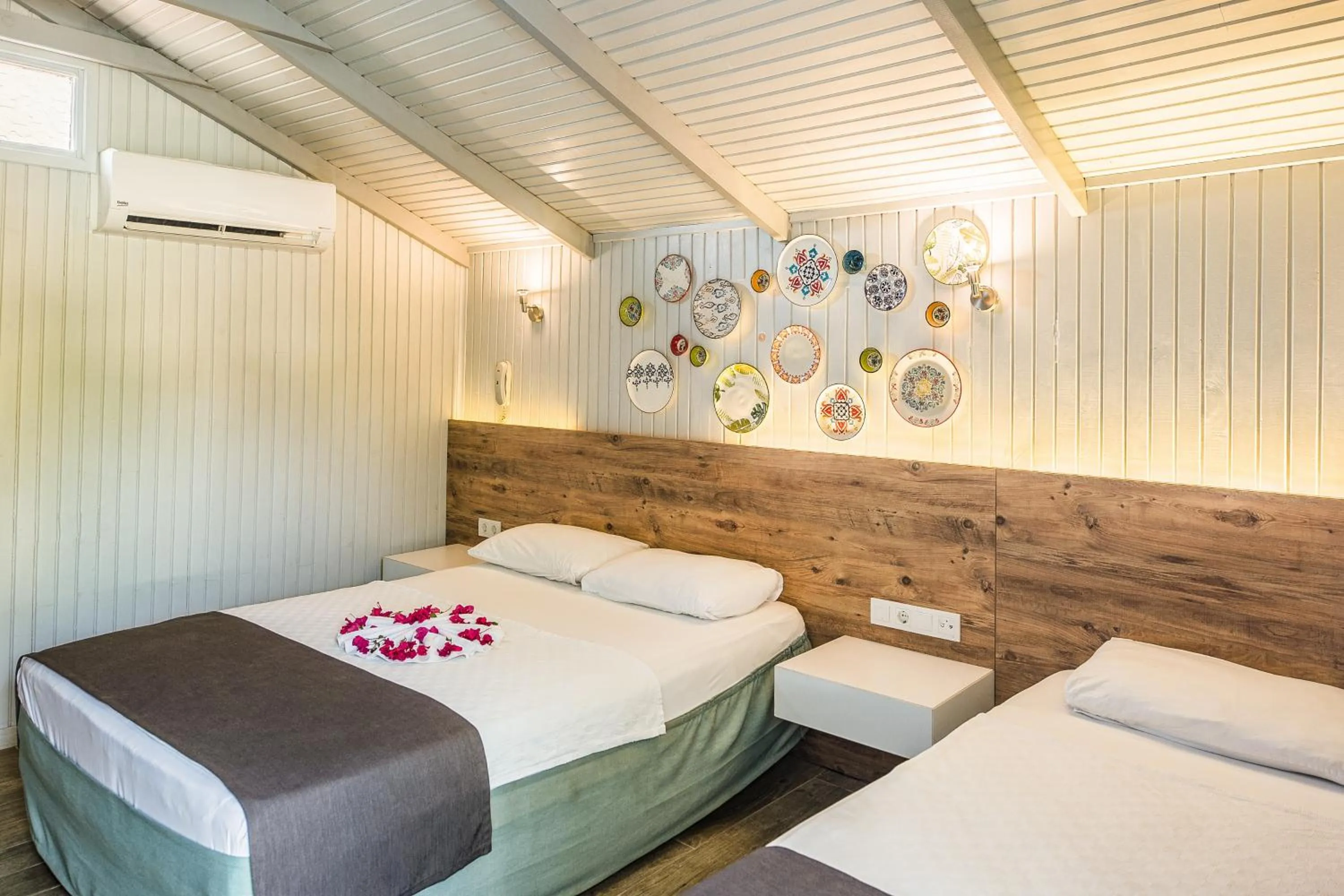 Bed in Leda Beach Hotel