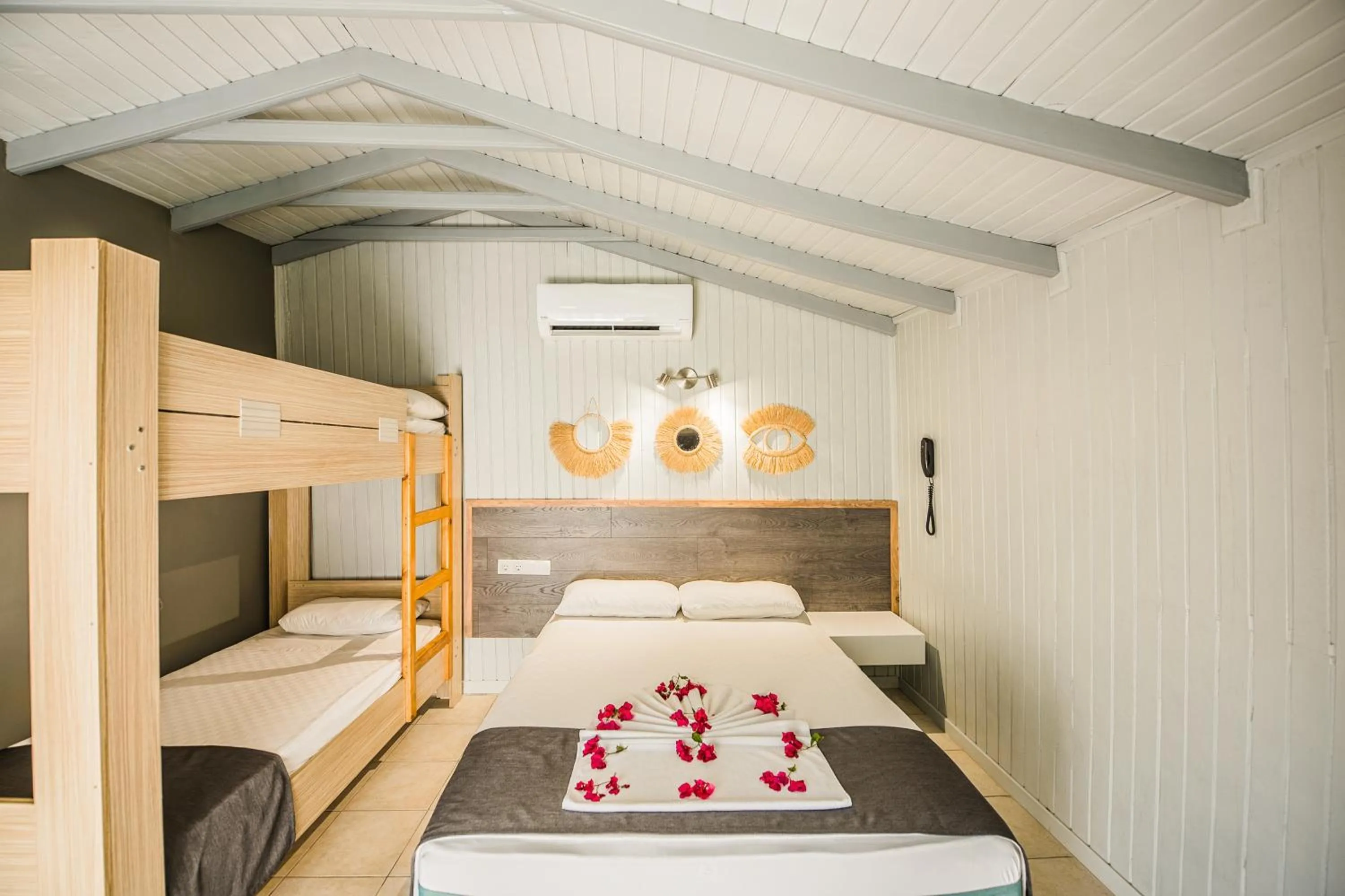 Bed in Leda Beach Hotel