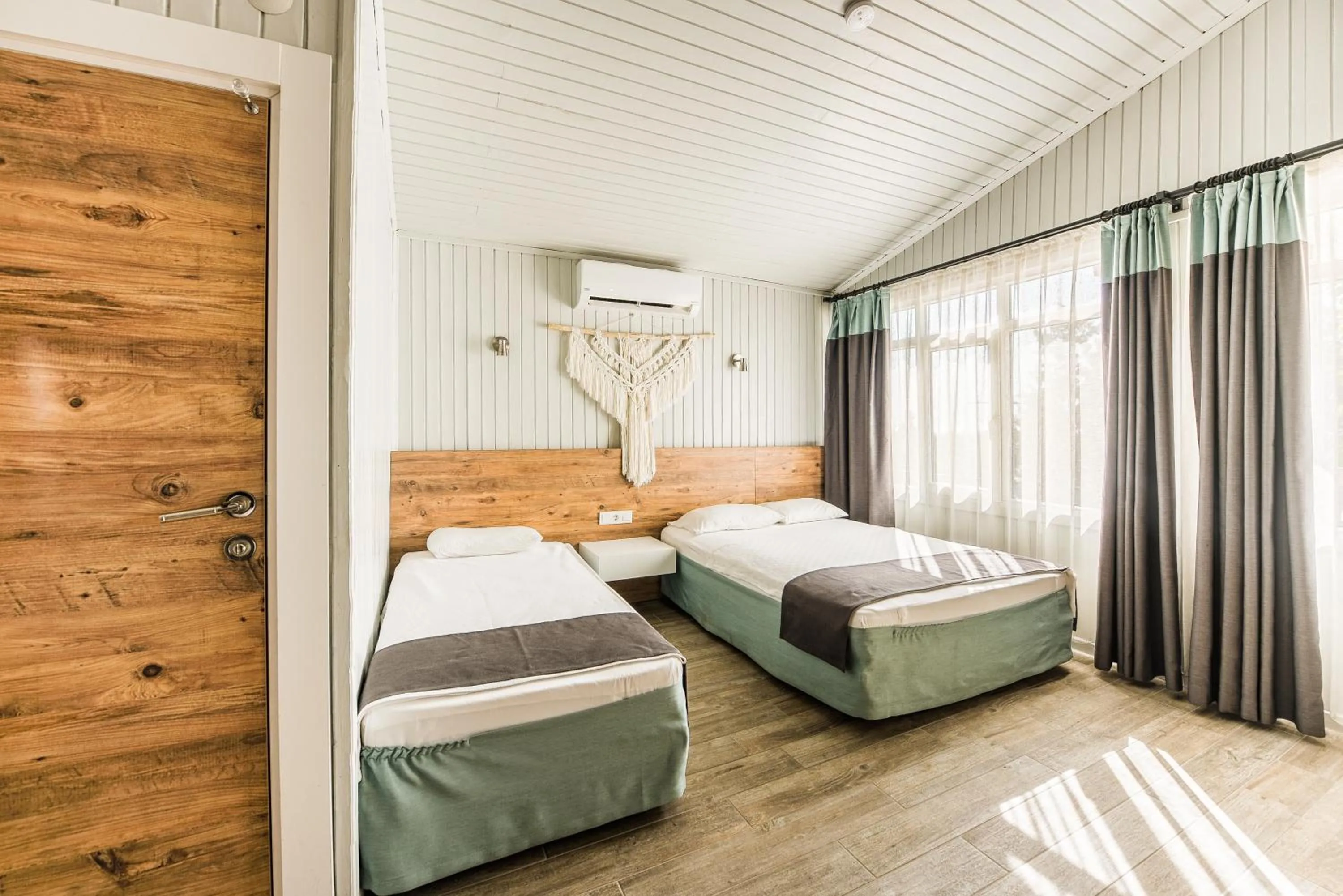 Bed in Leda Beach Hotel