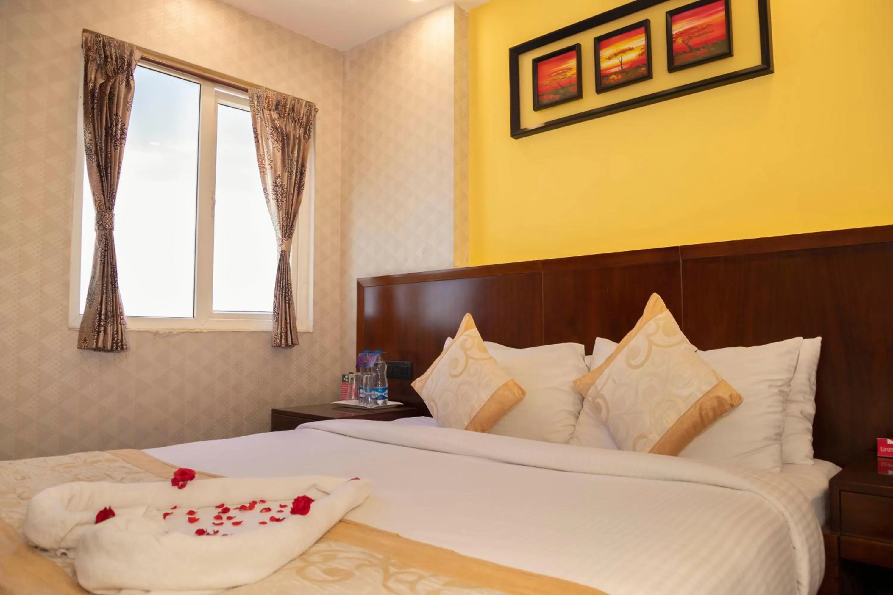 Bed in THE PEBBLE Boutique Hotel