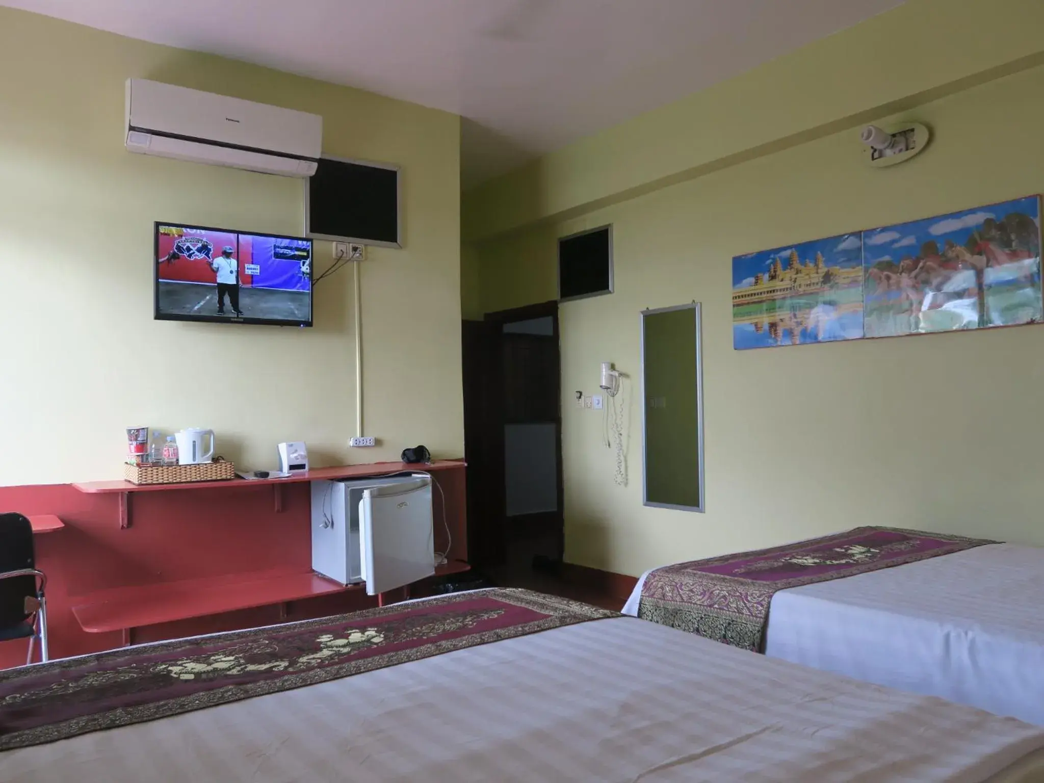 Bed in River Dolphin Hotel Bed in River Dolphin Hotel