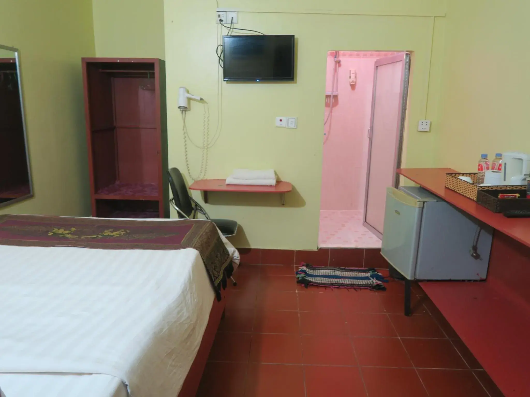 Bed in River Dolphin Hotel Bed in River Dolphin Hotel