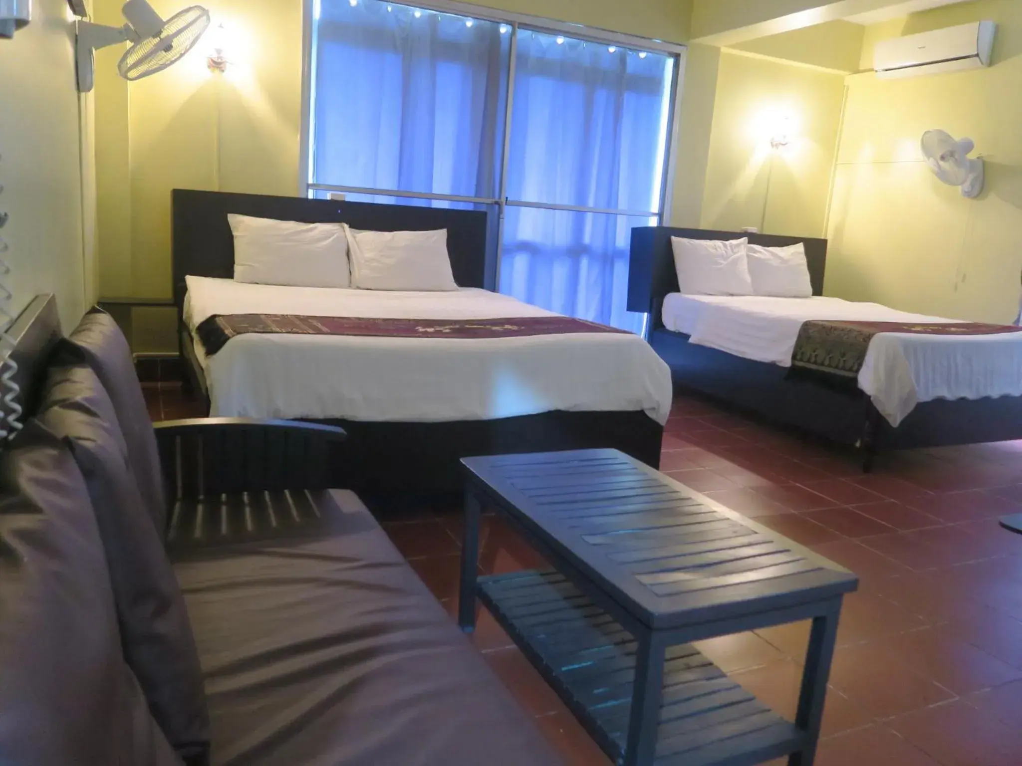 Bed in River Dolphin Hotel Bed in River Dolphin Hotel