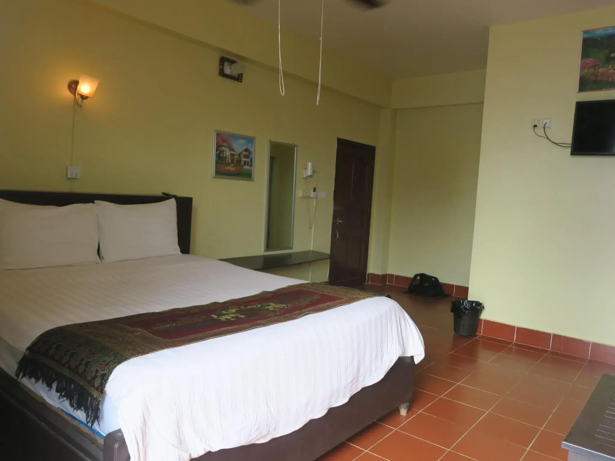 Bed in River Dolphin Hotel Bed in River Dolphin Hotel