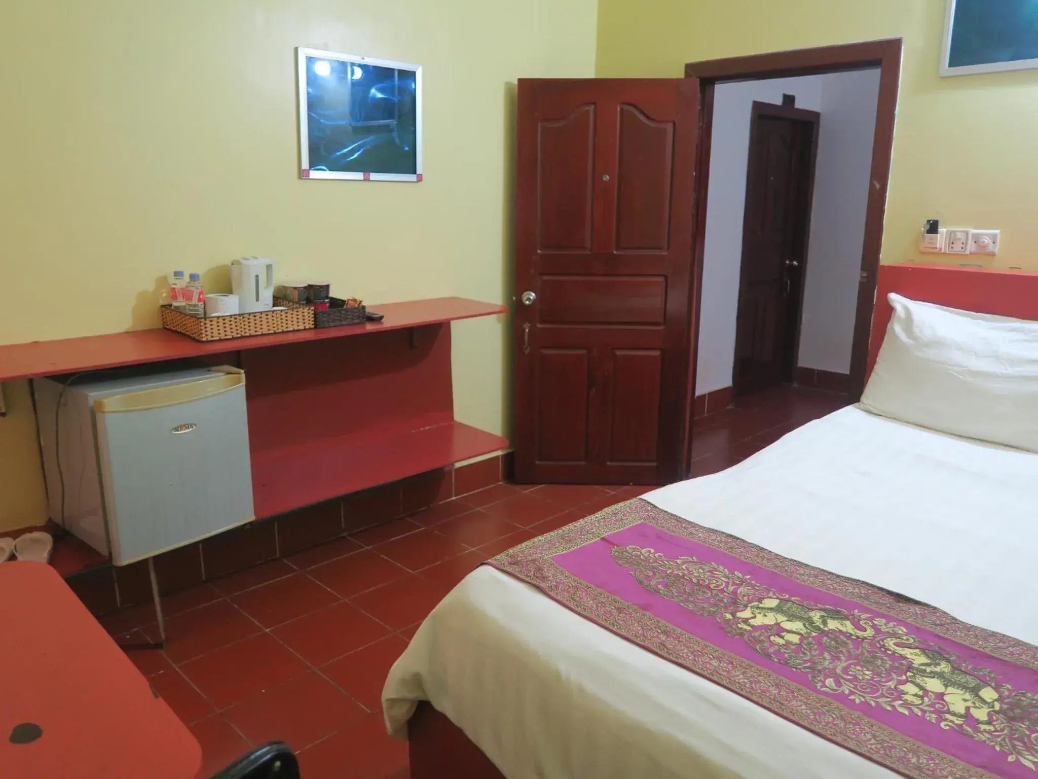 Bed in River Dolphin Hotel Bed in River Dolphin Hotel