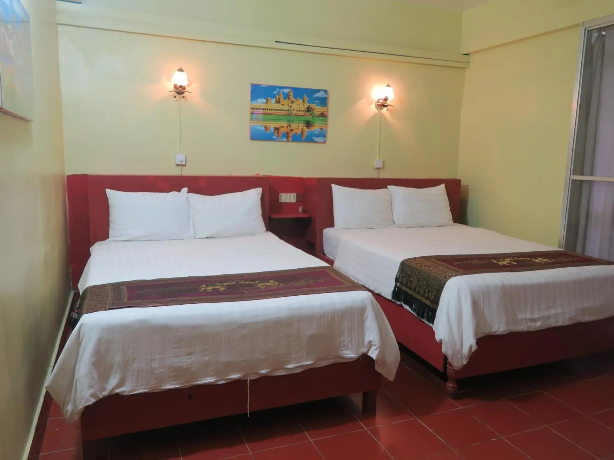 Bed in River Dolphin Hotel Bed in River Dolphin Hotel