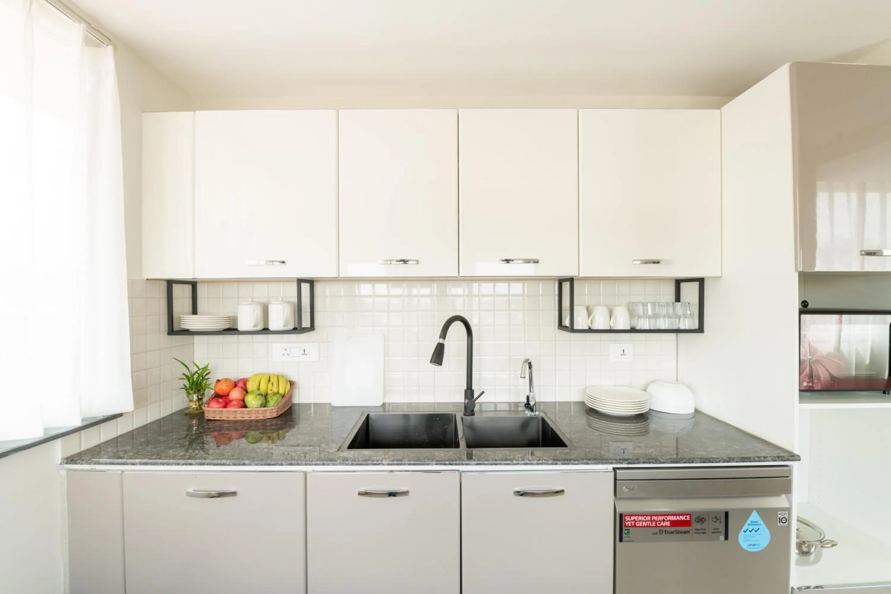 Kitchen or kitchenette in Mila Hotel