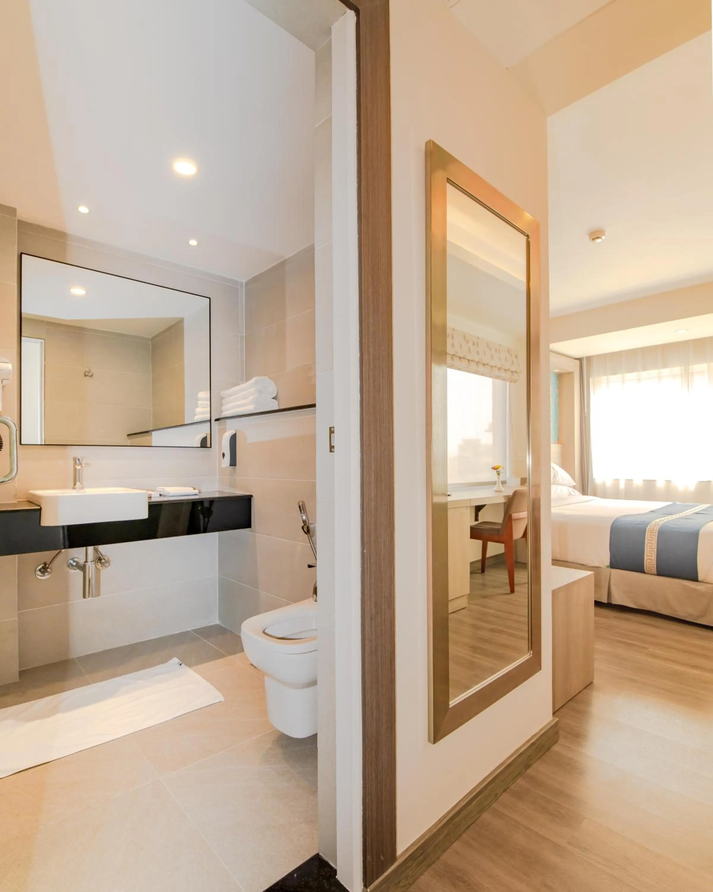 Toilet, Bed in Mila Hotel