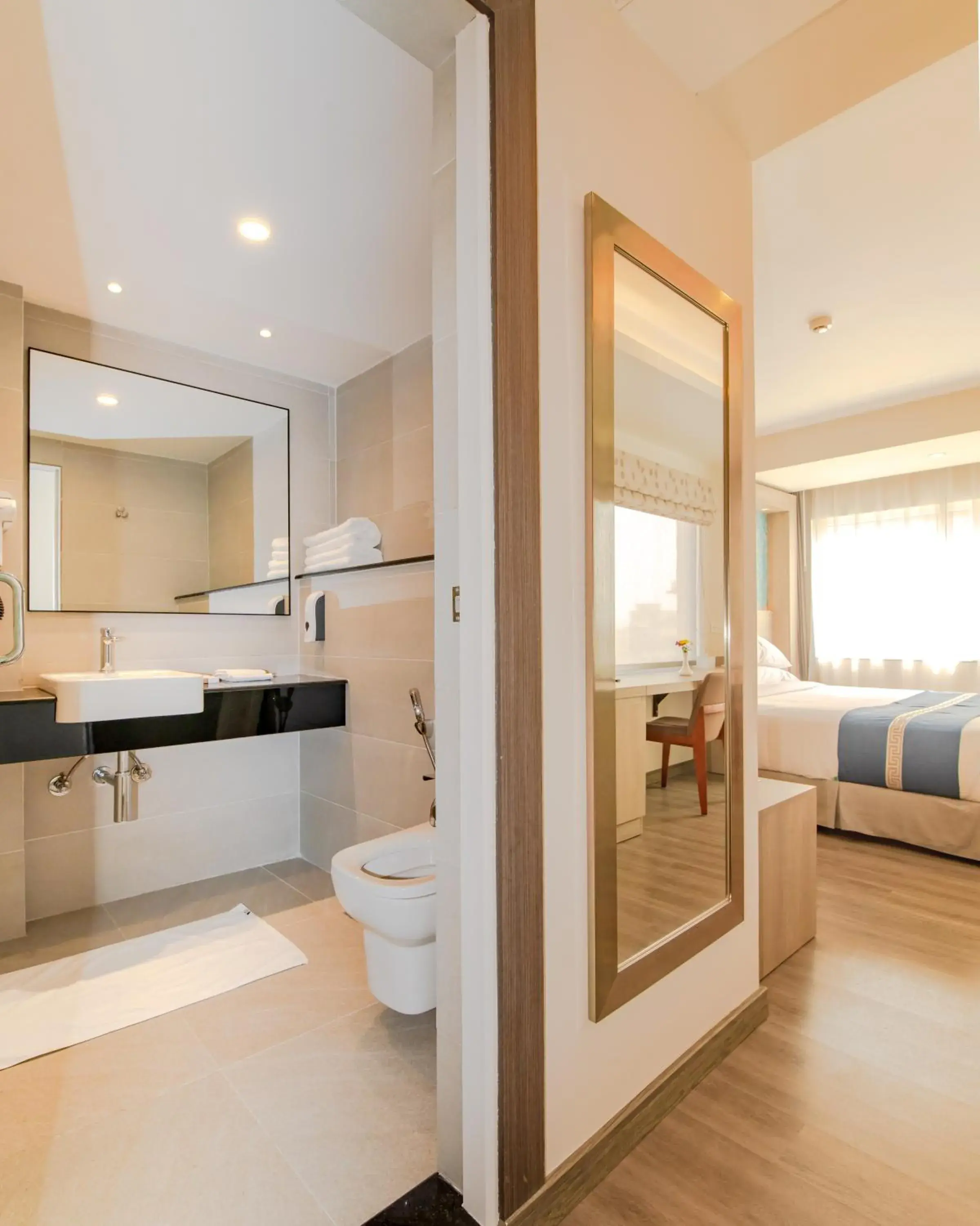 Toilet, Bed in Mila Hotel Toilet, Bed in Mila Hotel