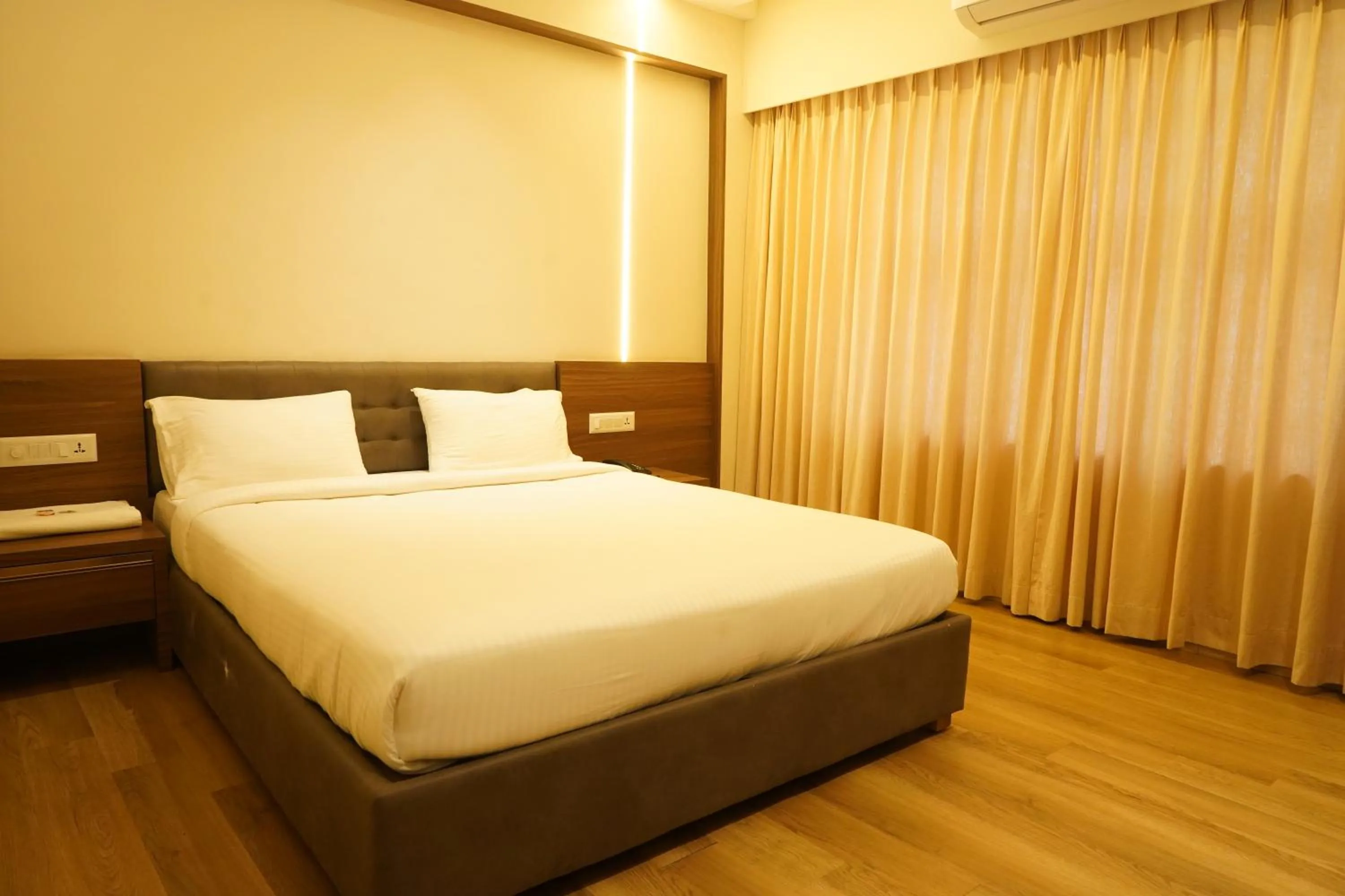 Bed in Hotel Bekal International