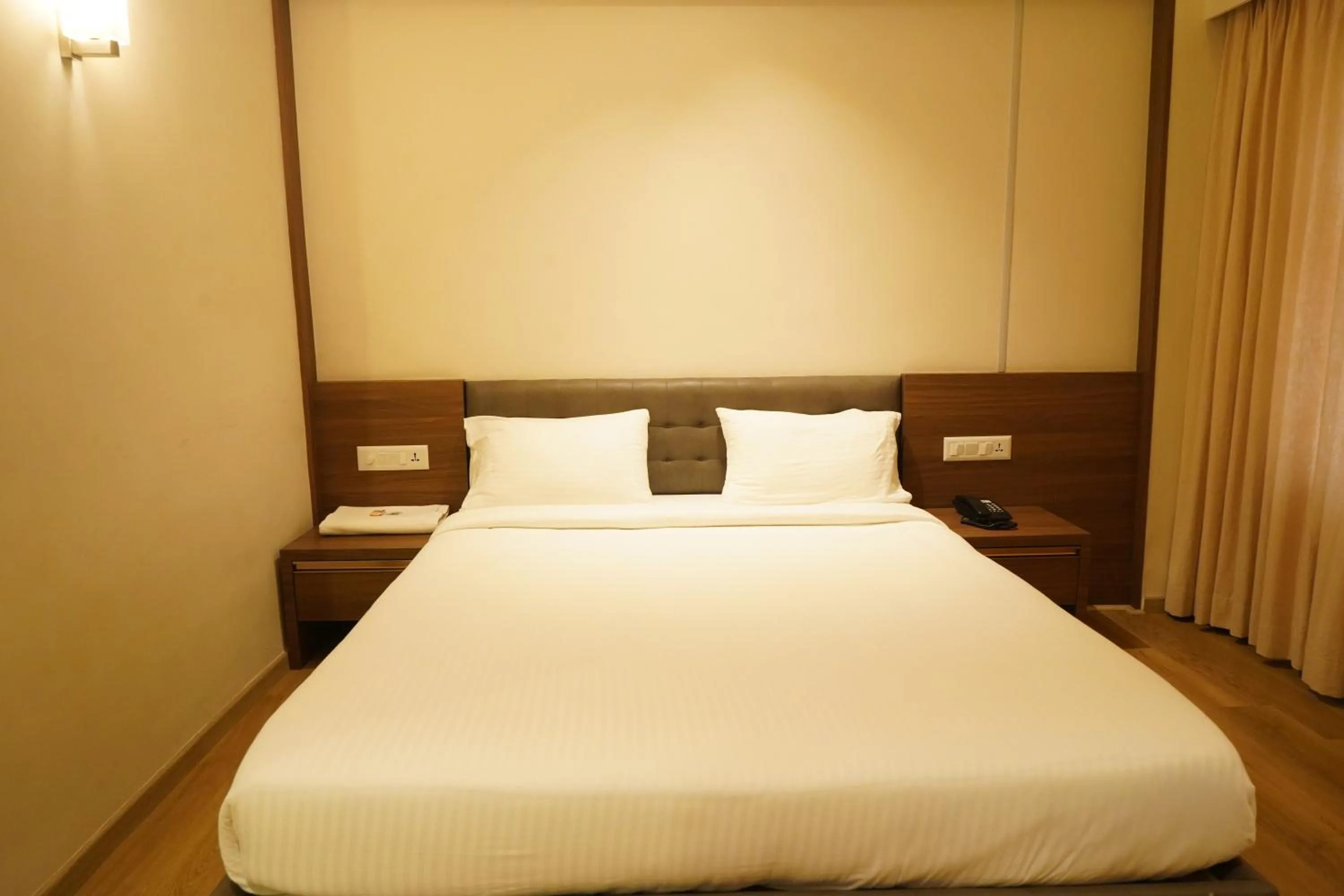 Bed in Hotel Bekal International