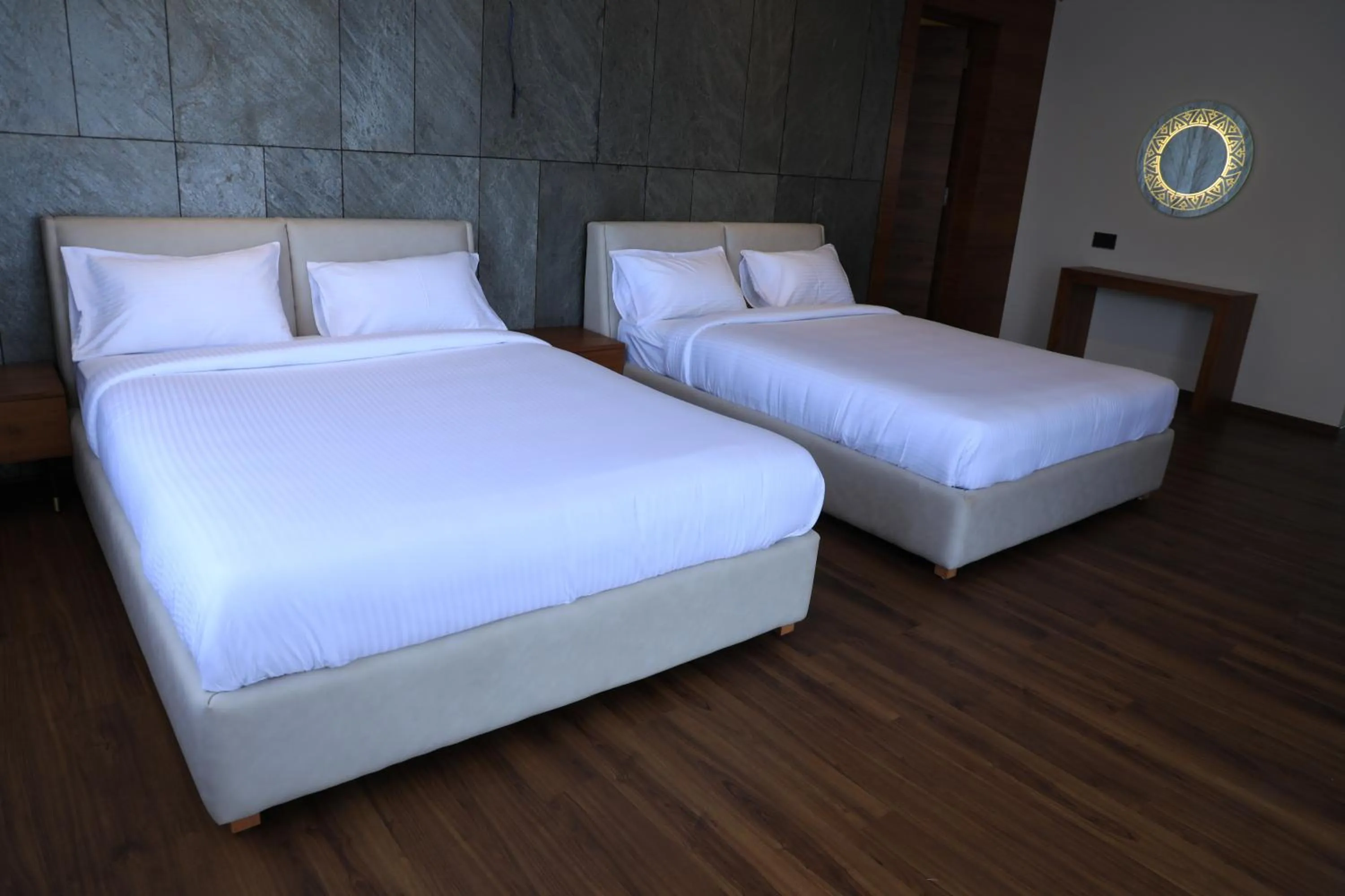 Bed in Hotel Bekal International