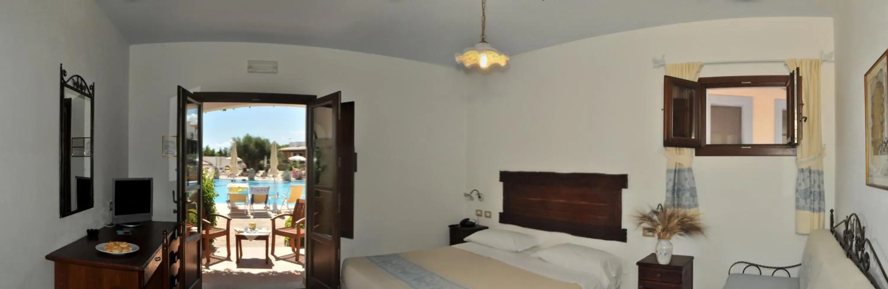 Bedroom in Hotel Resort Nuraghe Arvu Bedroom in Hotel Resort Nuraghe Arvu