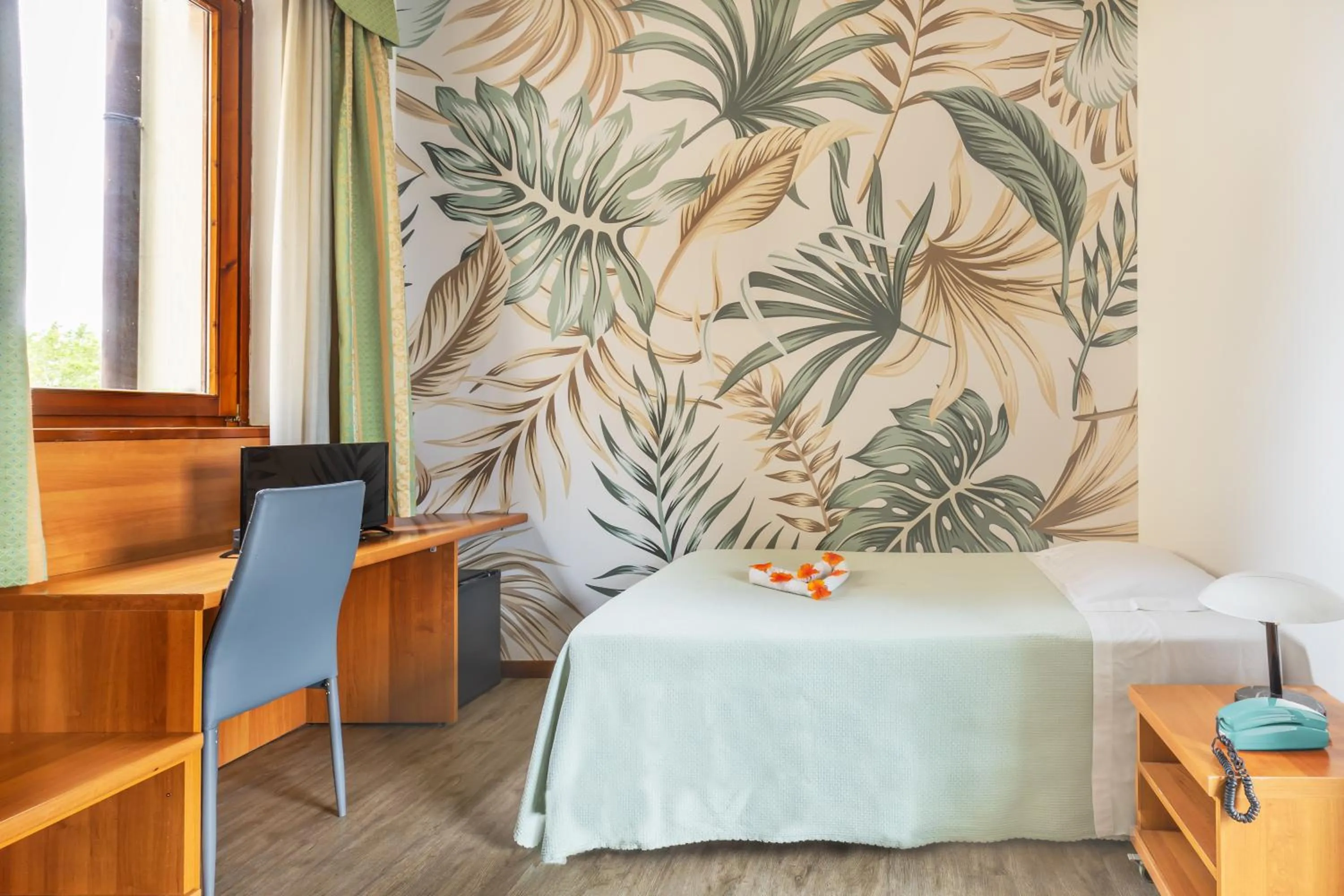 Bed in Hotel City Verona