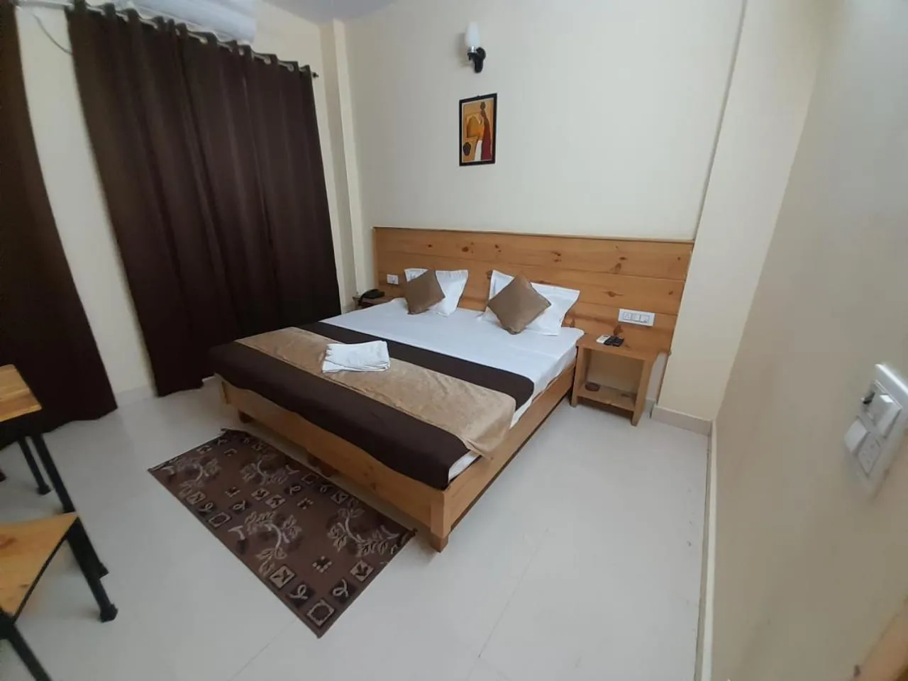 Photo of the whole room, Bed in Hotel Krishna Rishikesh