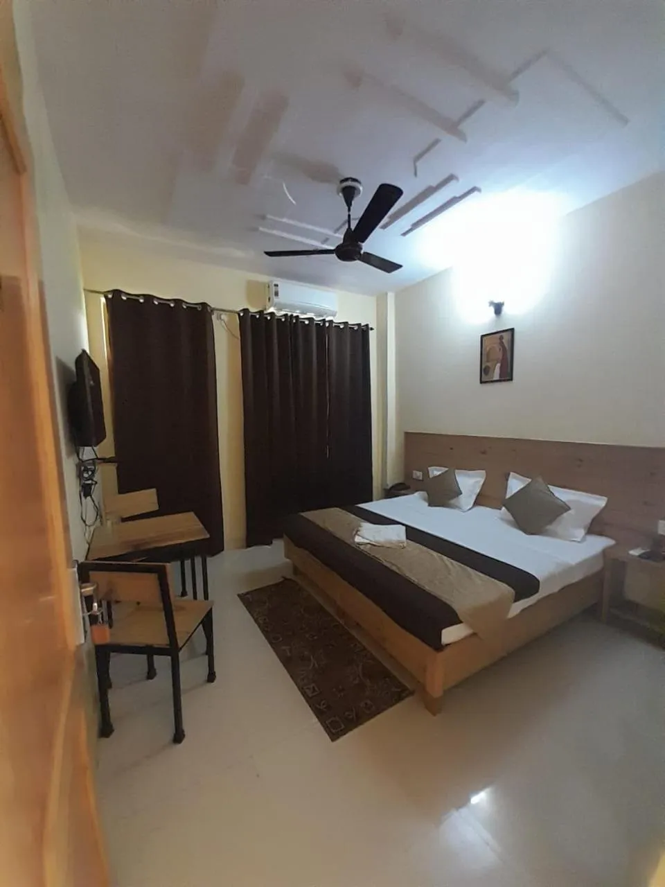 Photo of the whole room, Bed in Hotel Krishna Rishikesh