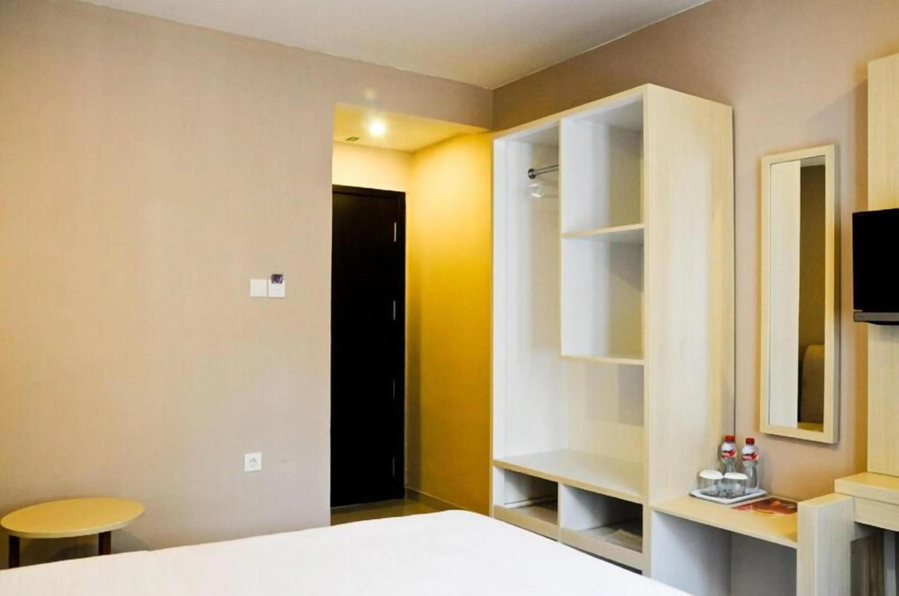 Photo of the whole room, Bed in Collection O Near Bajra Sandi Monumen Formerly Grand Pondok Puri Ayu