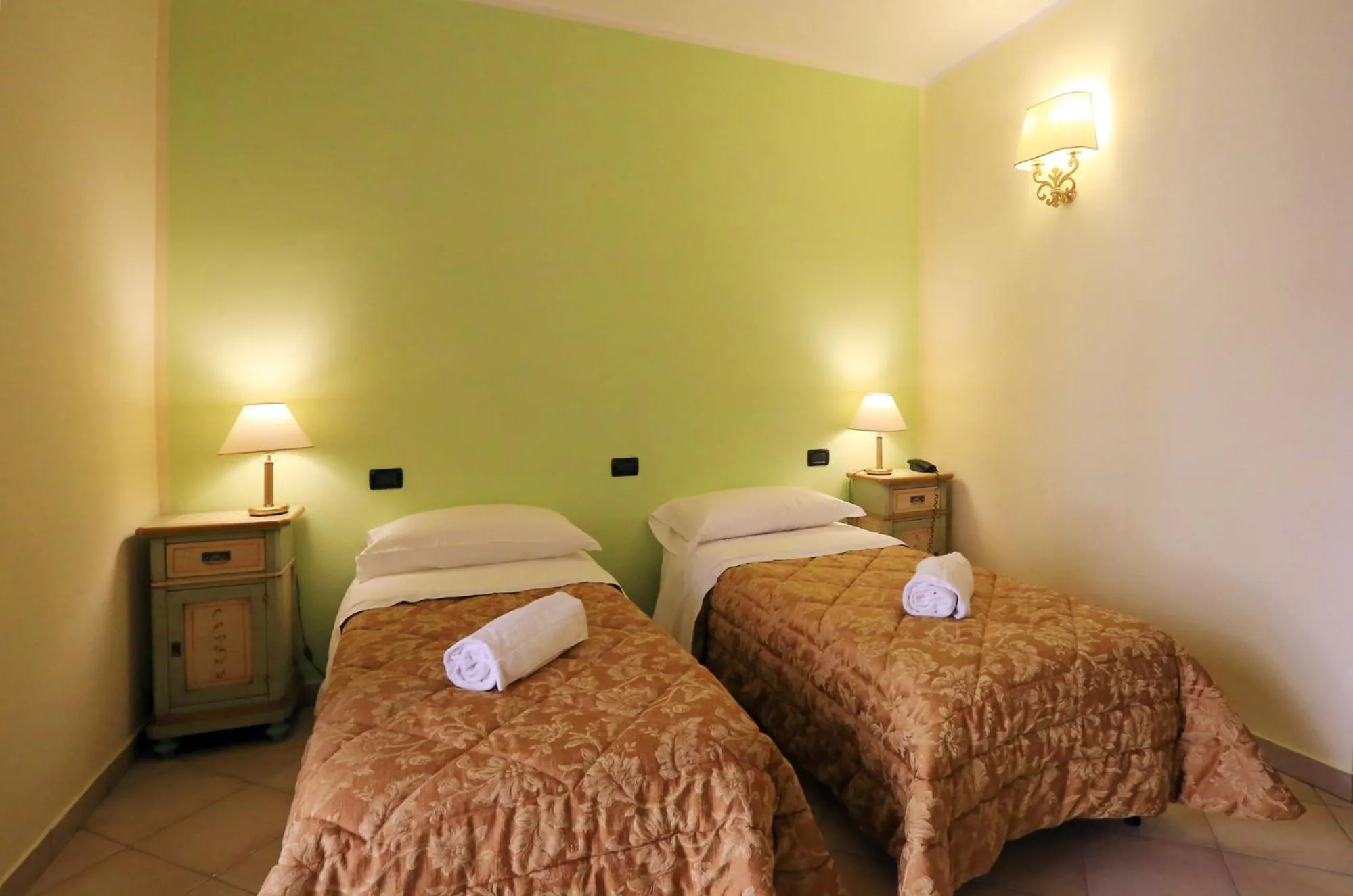 Bed in Hotel L'Aquila