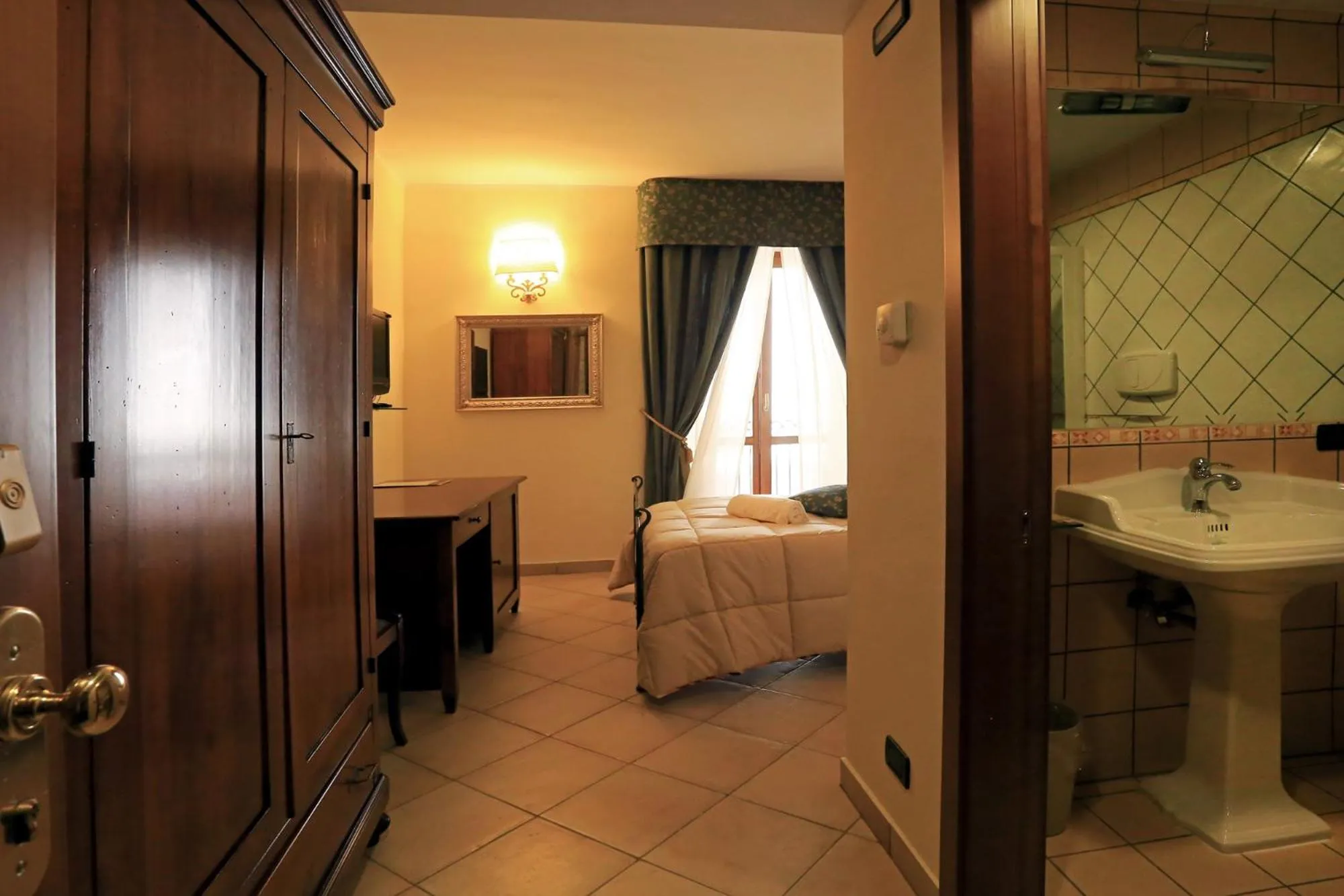 Photo of the whole room in Hotel L'Aquila