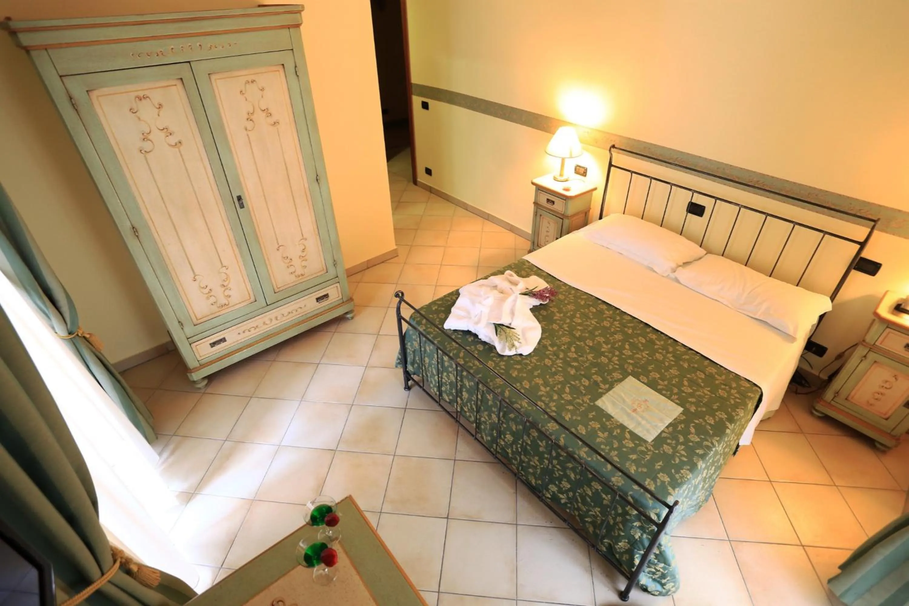 Photo of the whole room, Bed in Hotel L'Aquila