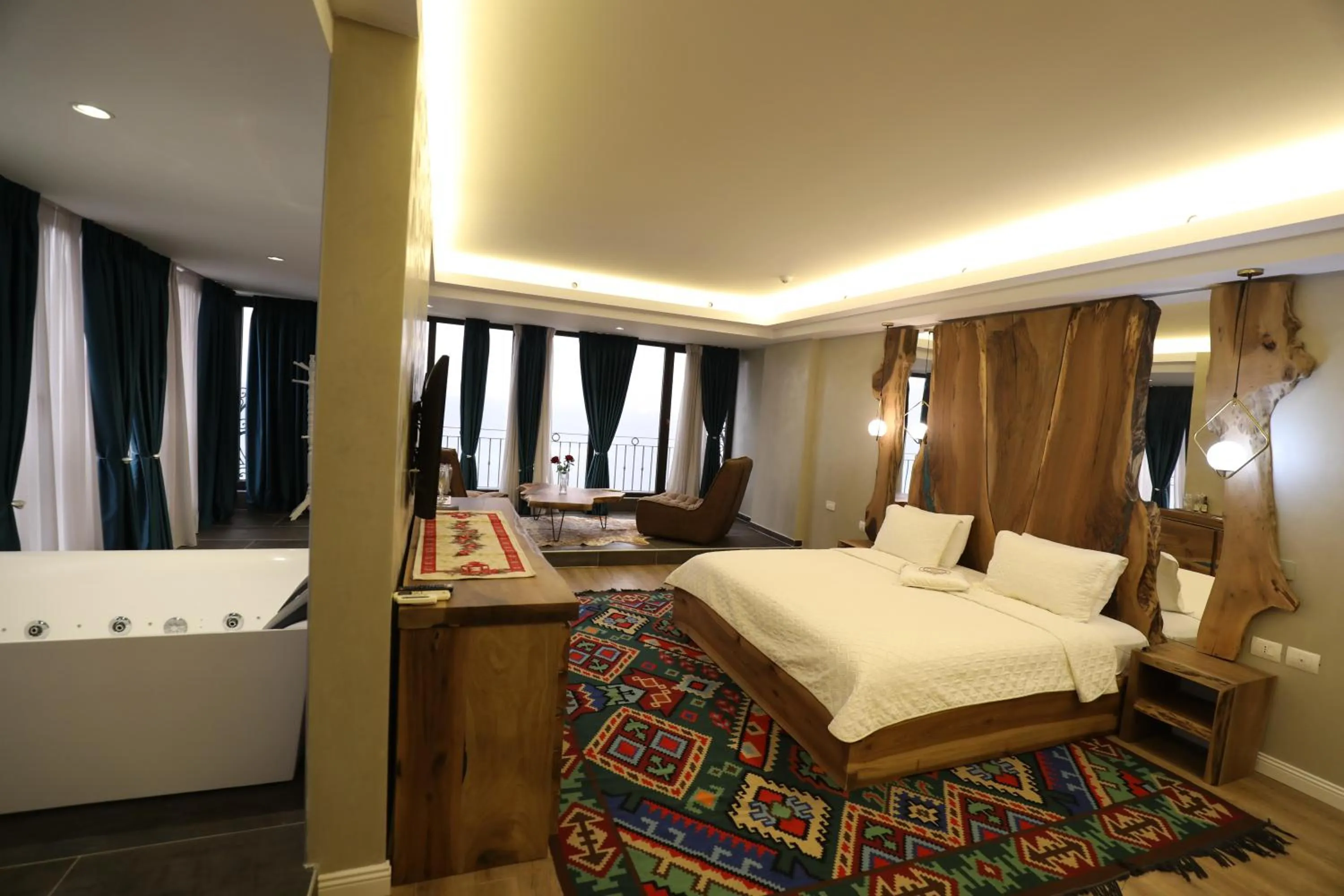 Seating area, Bed in Hotel 1 Maji