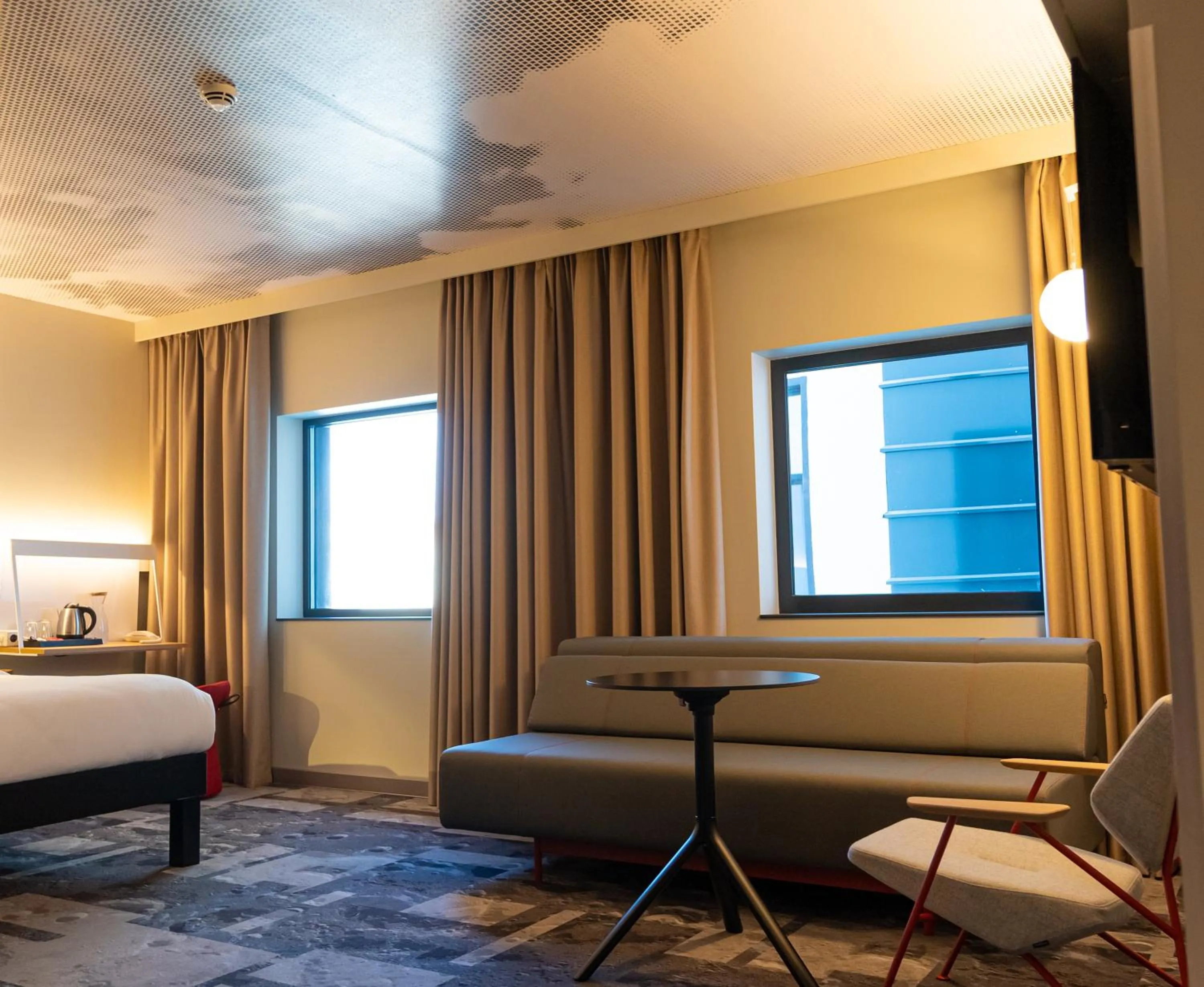 Living room, Bed in ibis Lviv Center