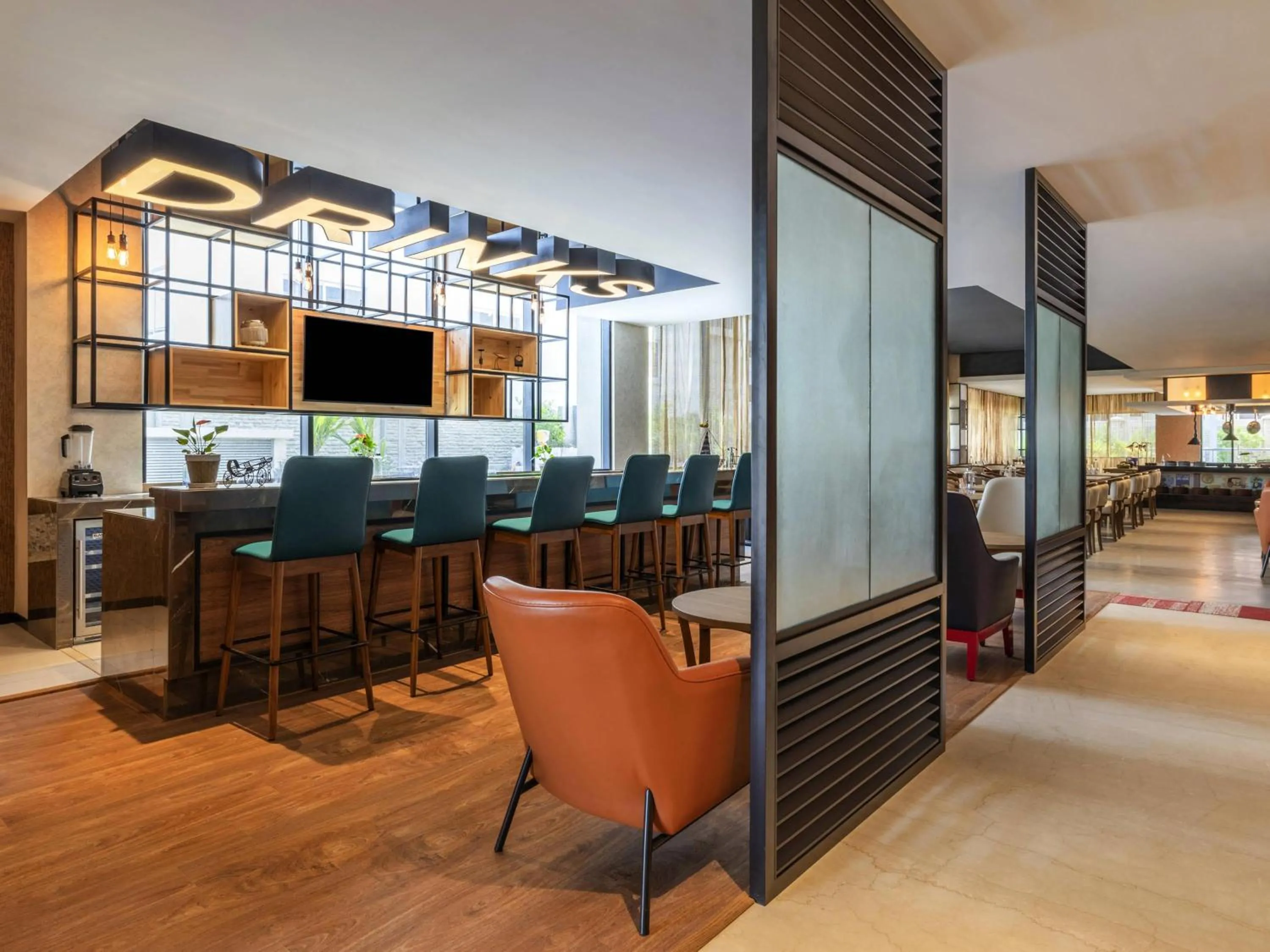 Lounge or bar in ibis Bengaluru Hebbal - An Accor Brand