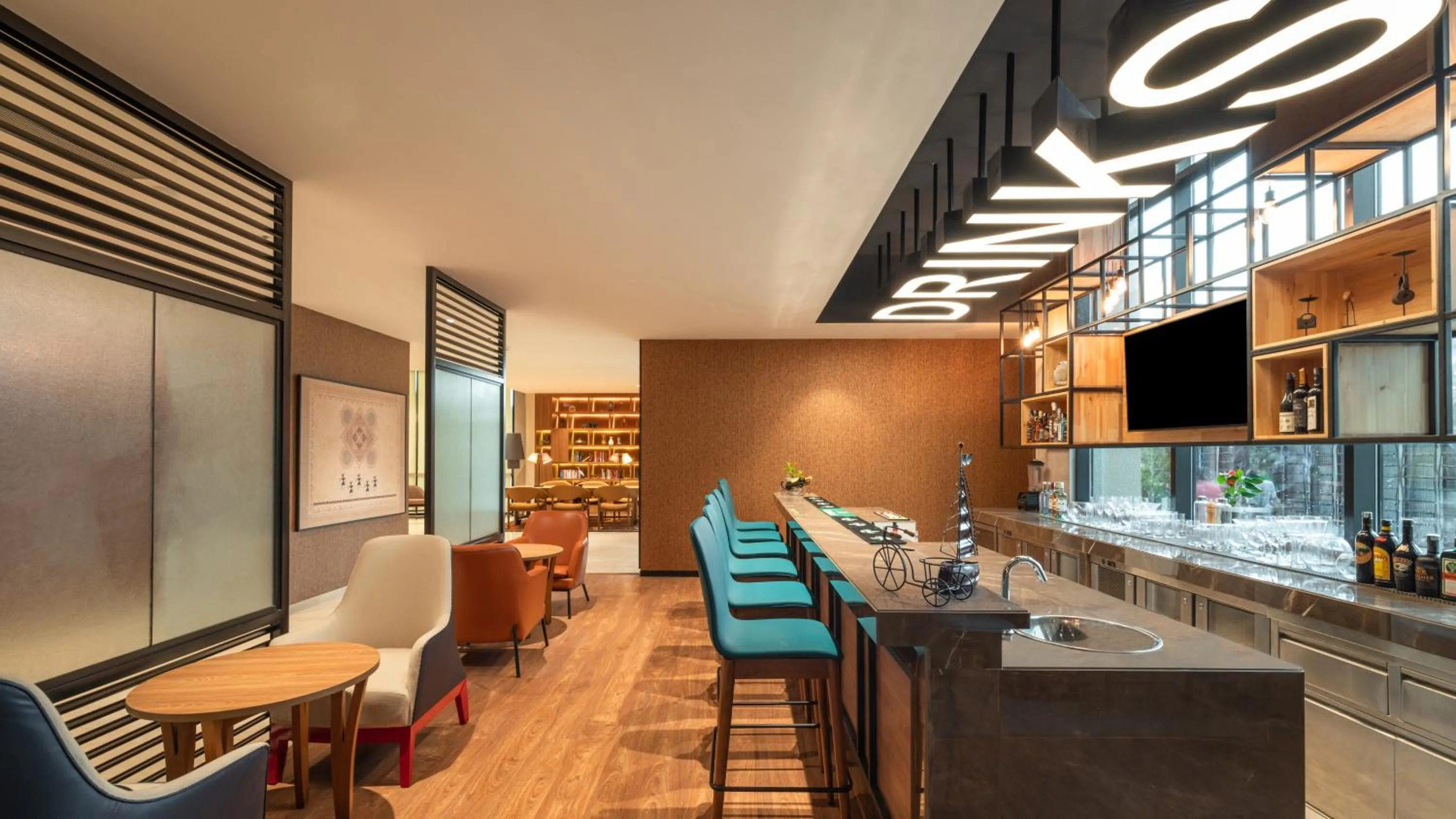 Lounge or bar in ibis Bengaluru Hebbal - An Accor Brand