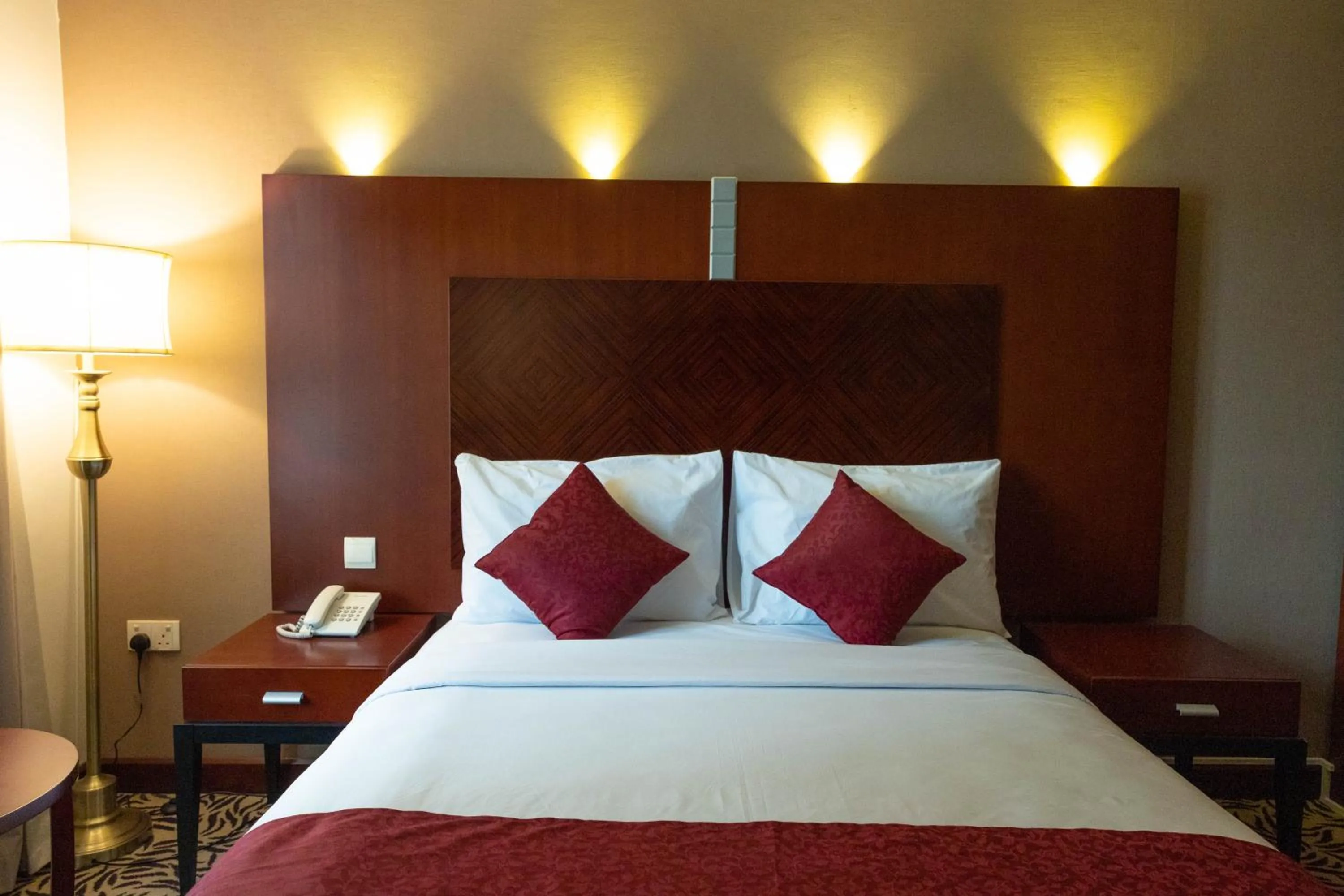 Bed in MRA Grand Hotel
