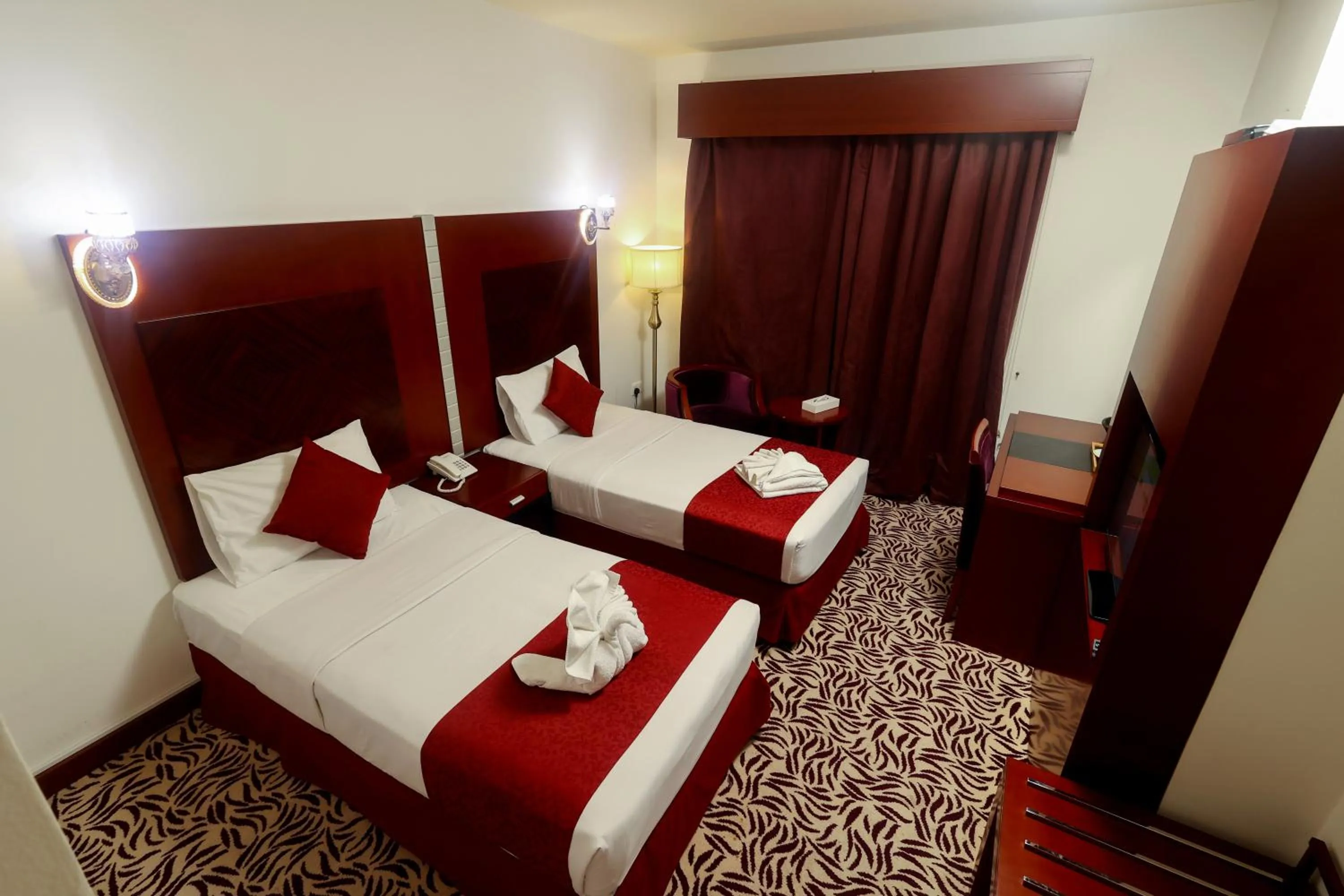 Bed in MRA Grand Hotel