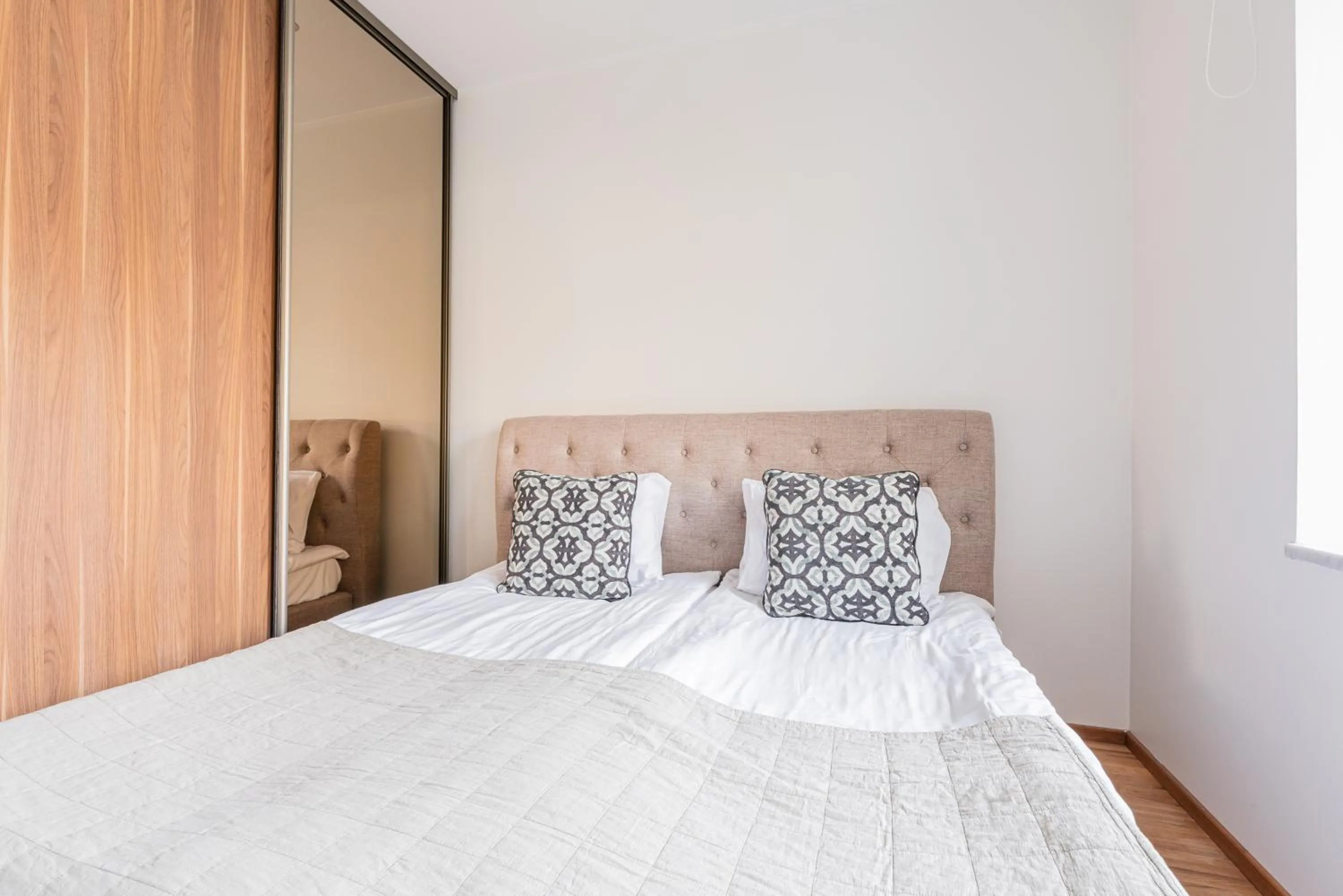 Bed in Yoga Residence Apartments